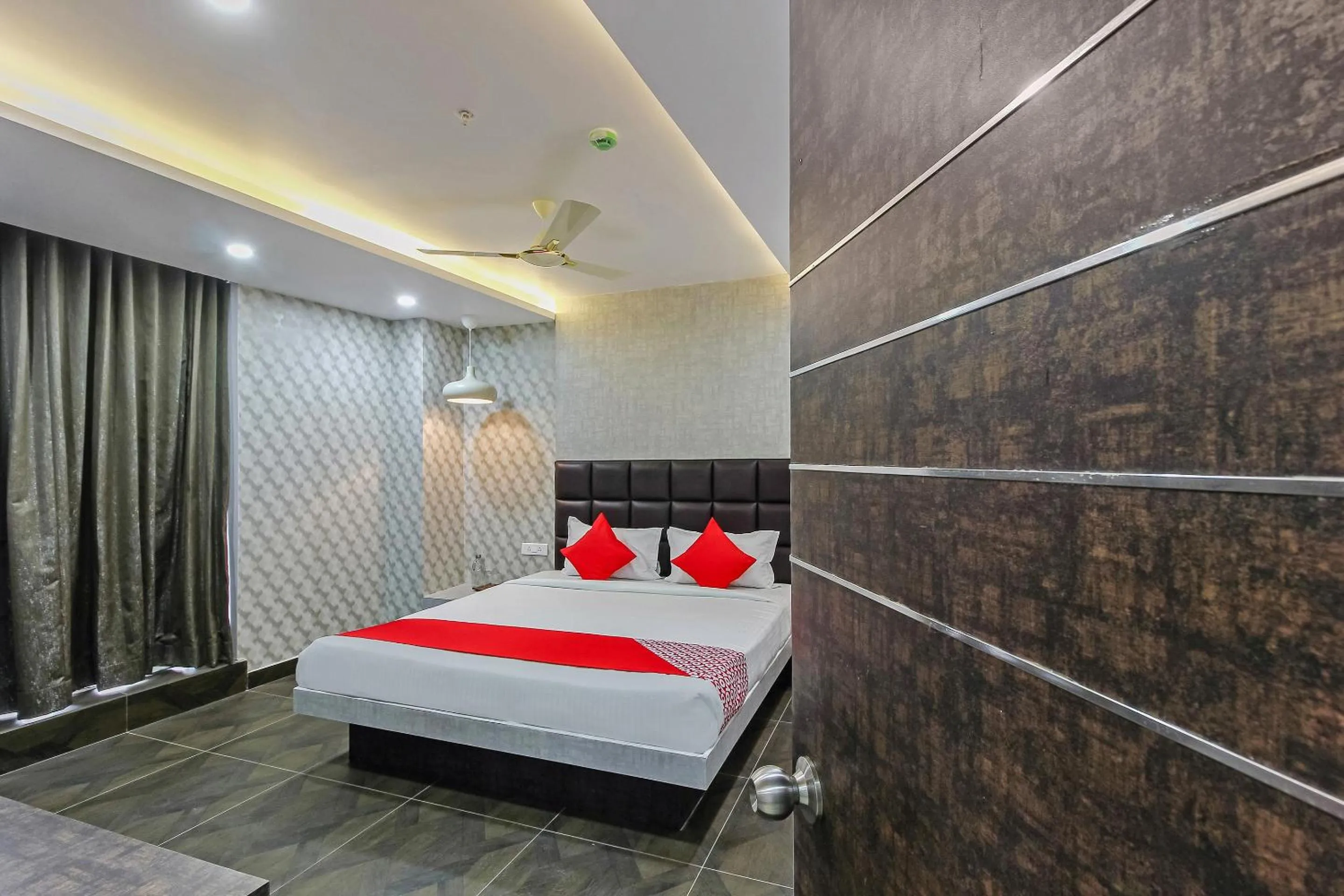 Bedroom, Bed in Capital O Hoysala Inn