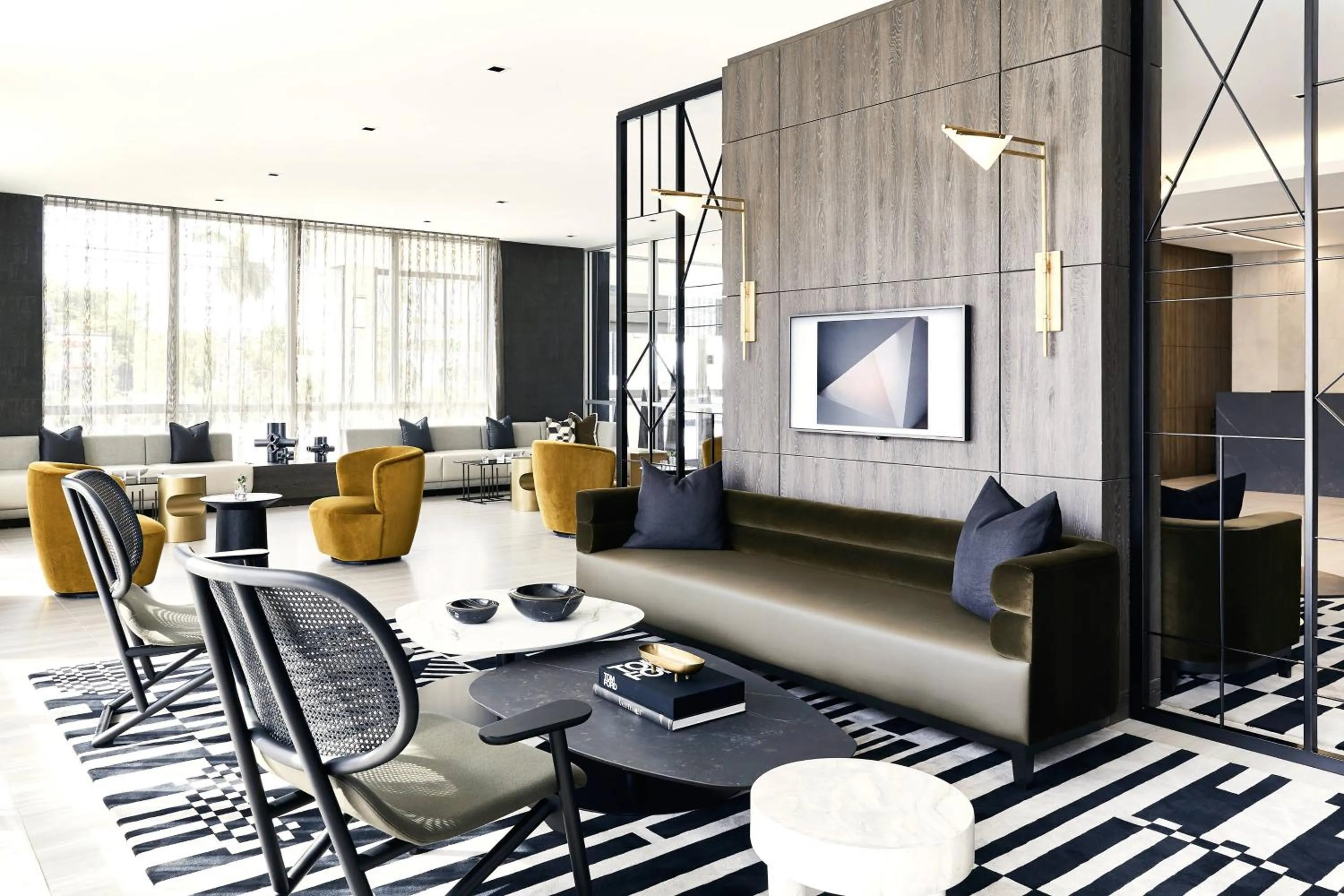 Lobby or reception in AC Hotel by Marriott Miami Airport West/Doral