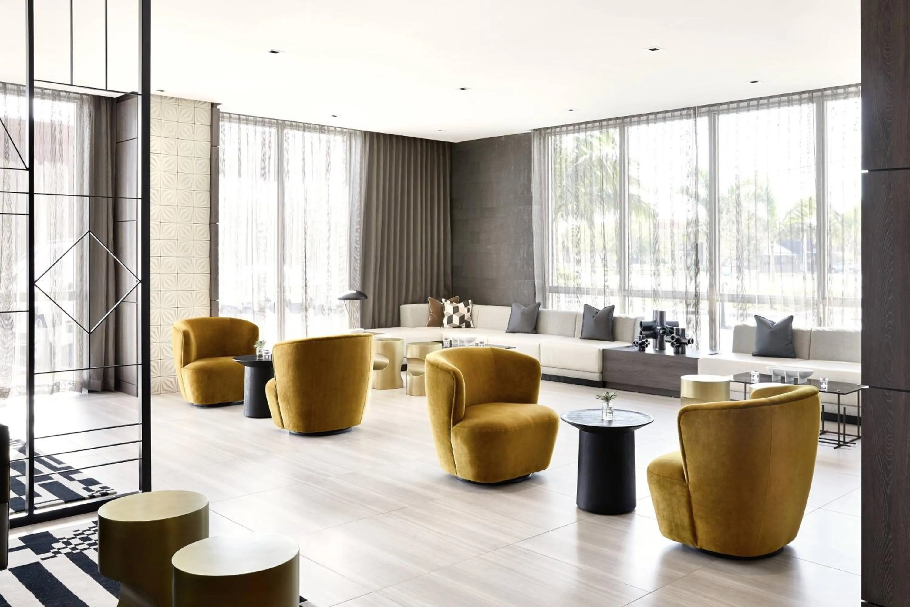Lobby or reception in AC Hotel by Marriott Miami Airport West/Doral