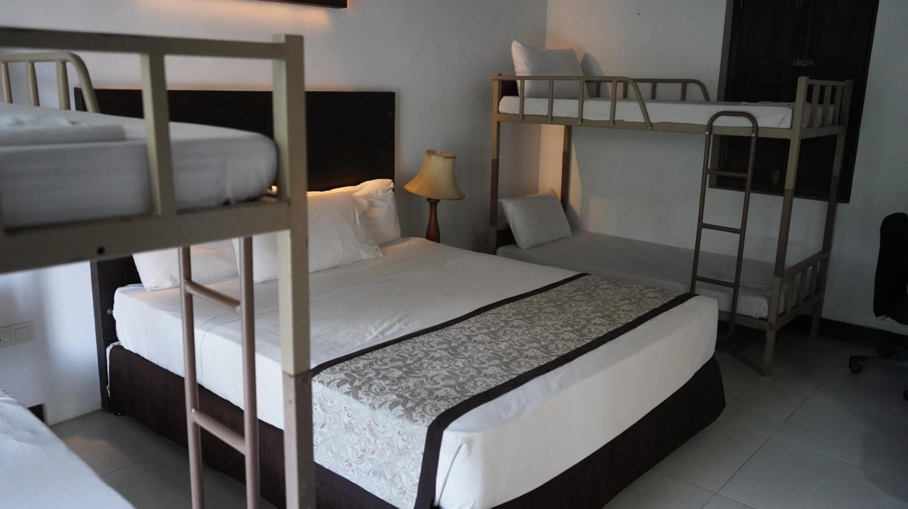 Photo of the whole room, Bed in Amaluna Resorts