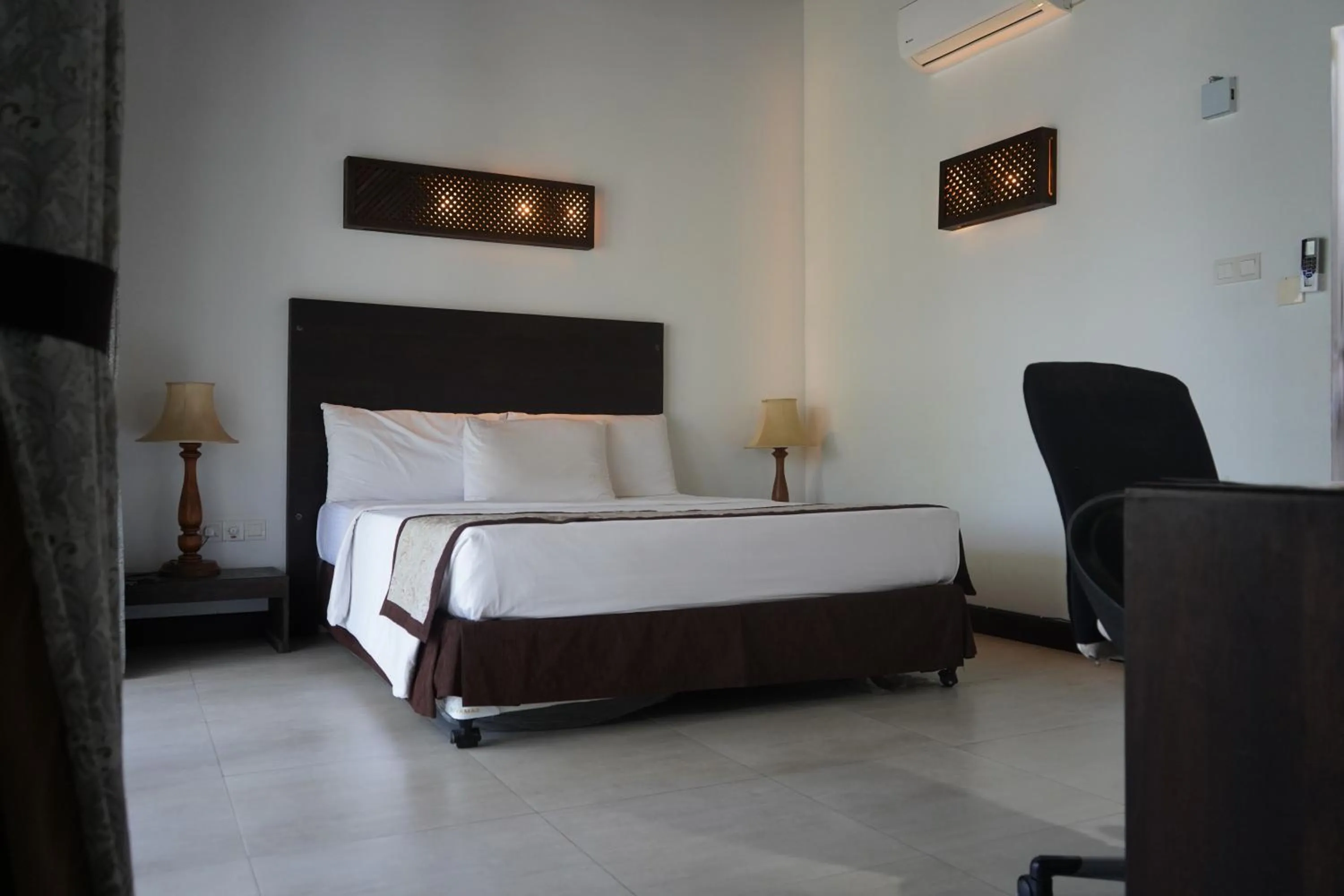 Bed in Amaluna Resorts