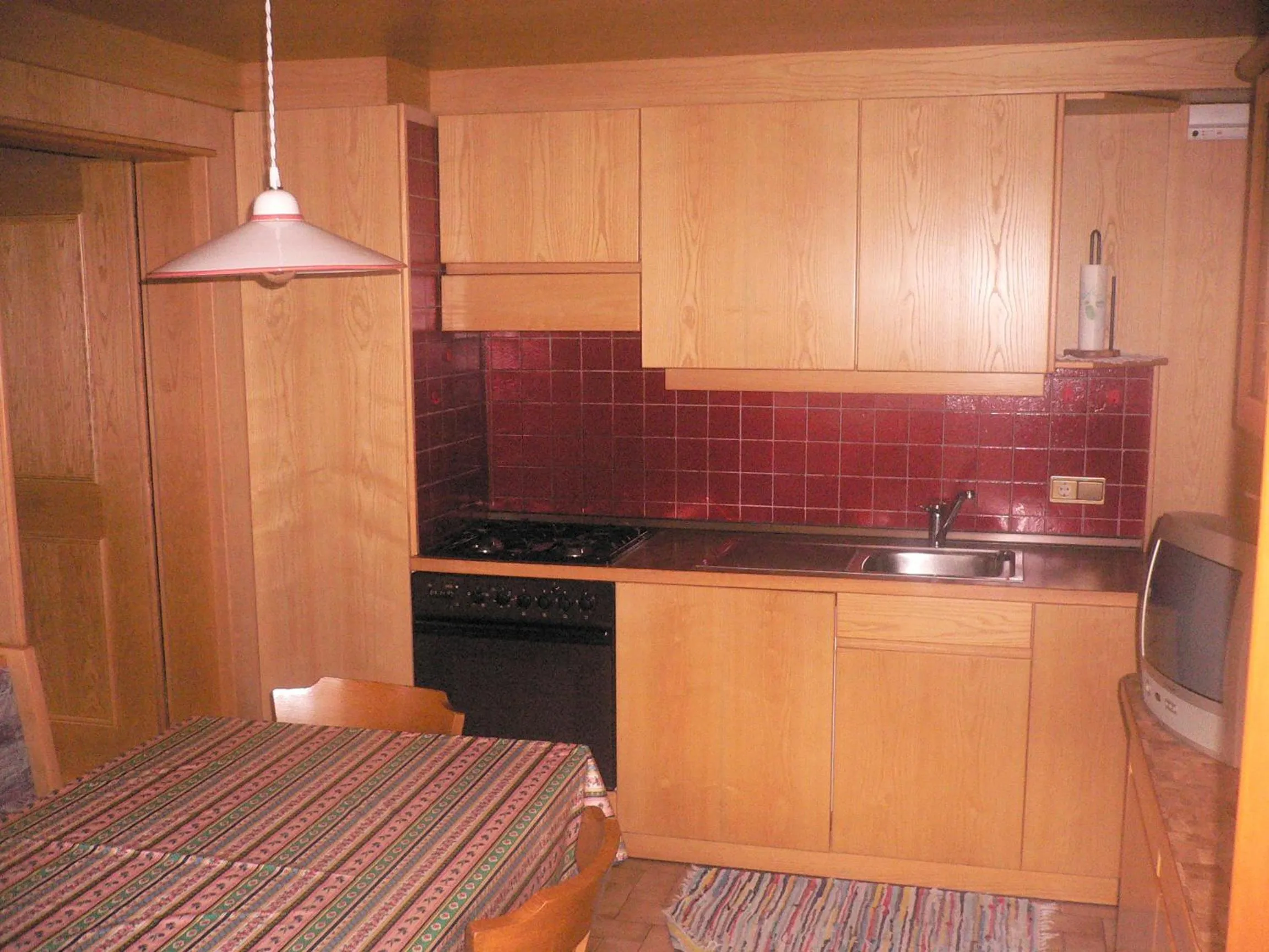 Kitchen or kitchenette in Appartamenti Residence Pars