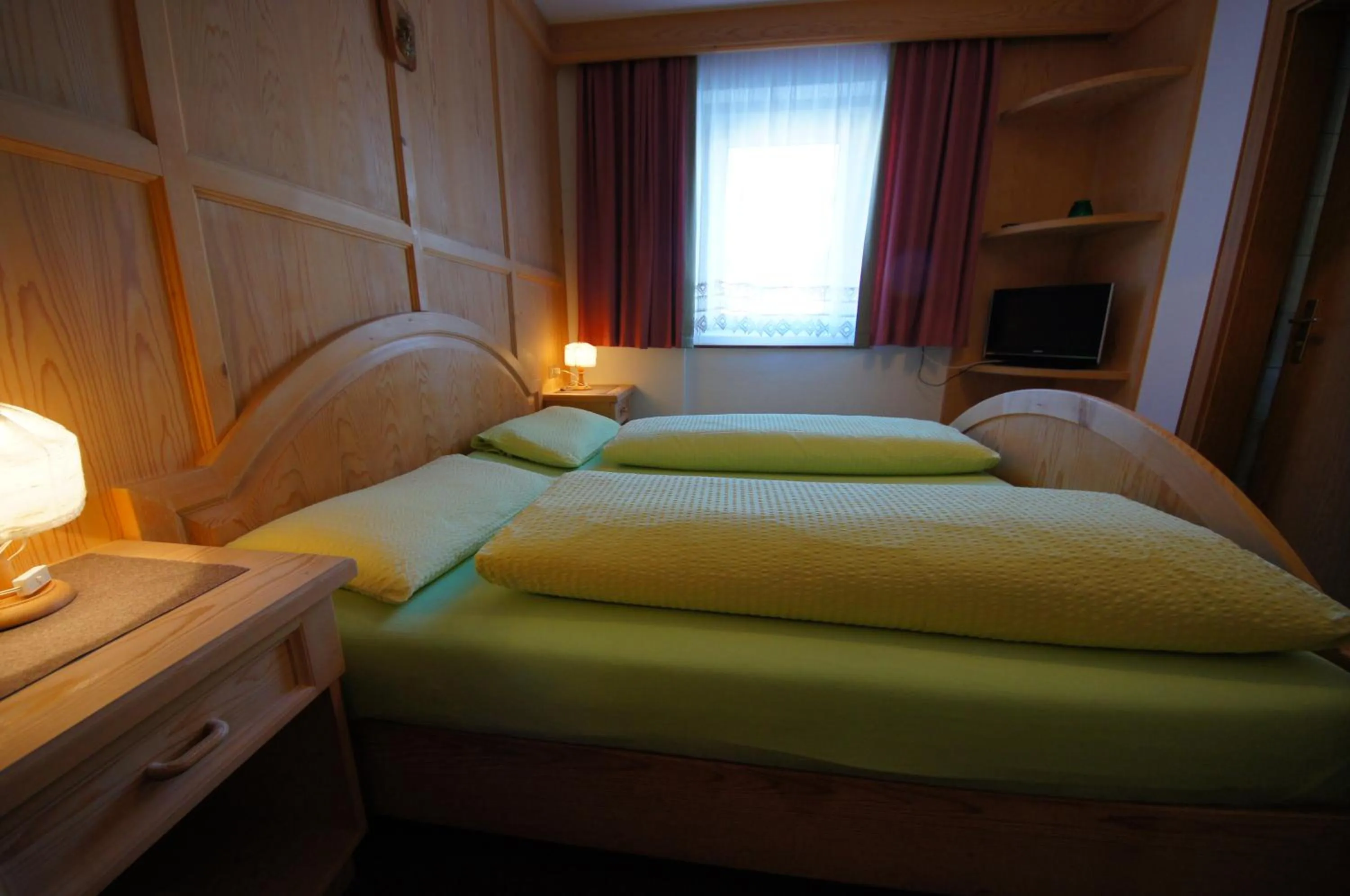 Bedroom, Bed in Appartamenti Residence Pars