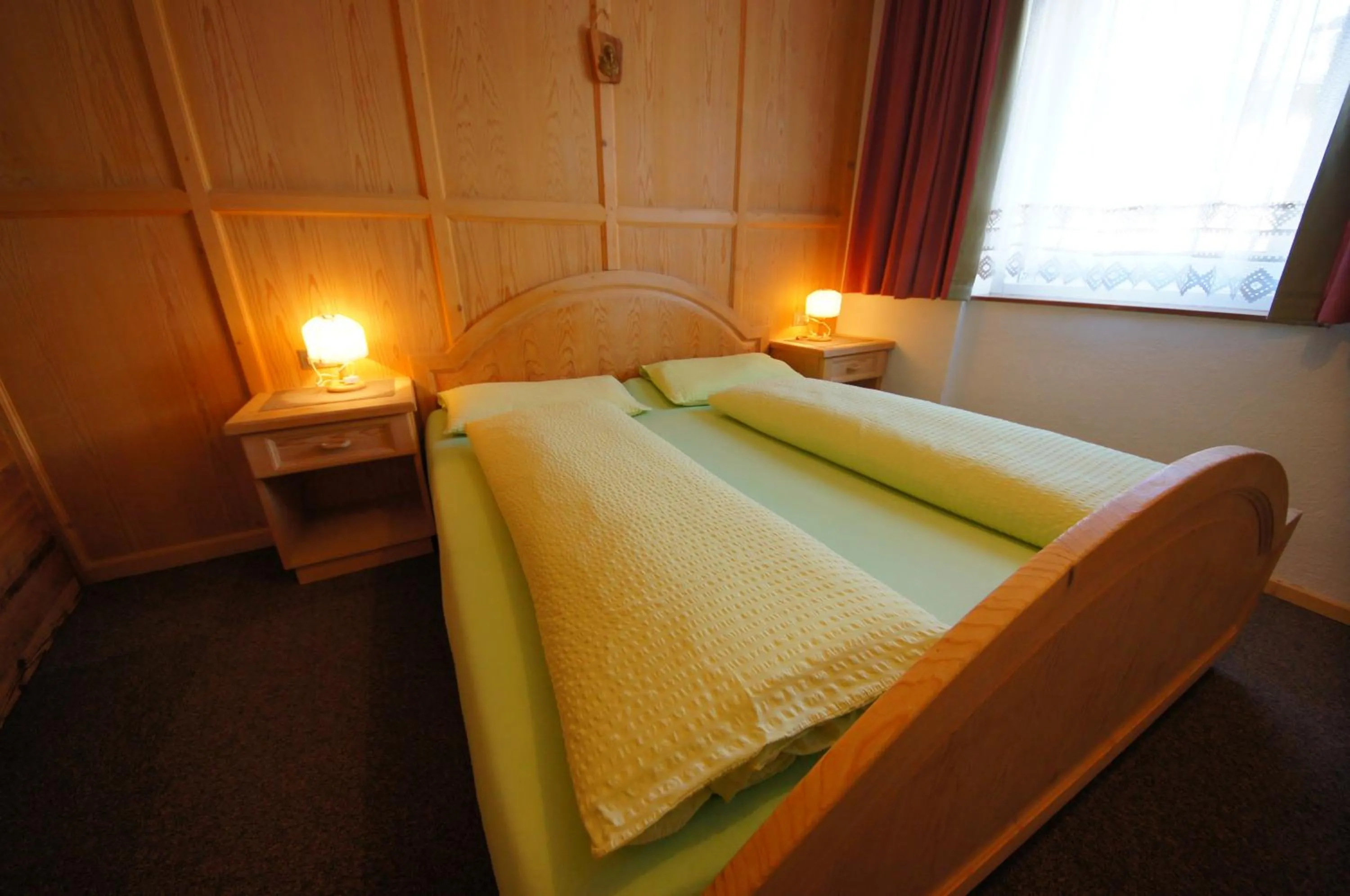 Bedroom, Bed in Appartamenti Residence Pars