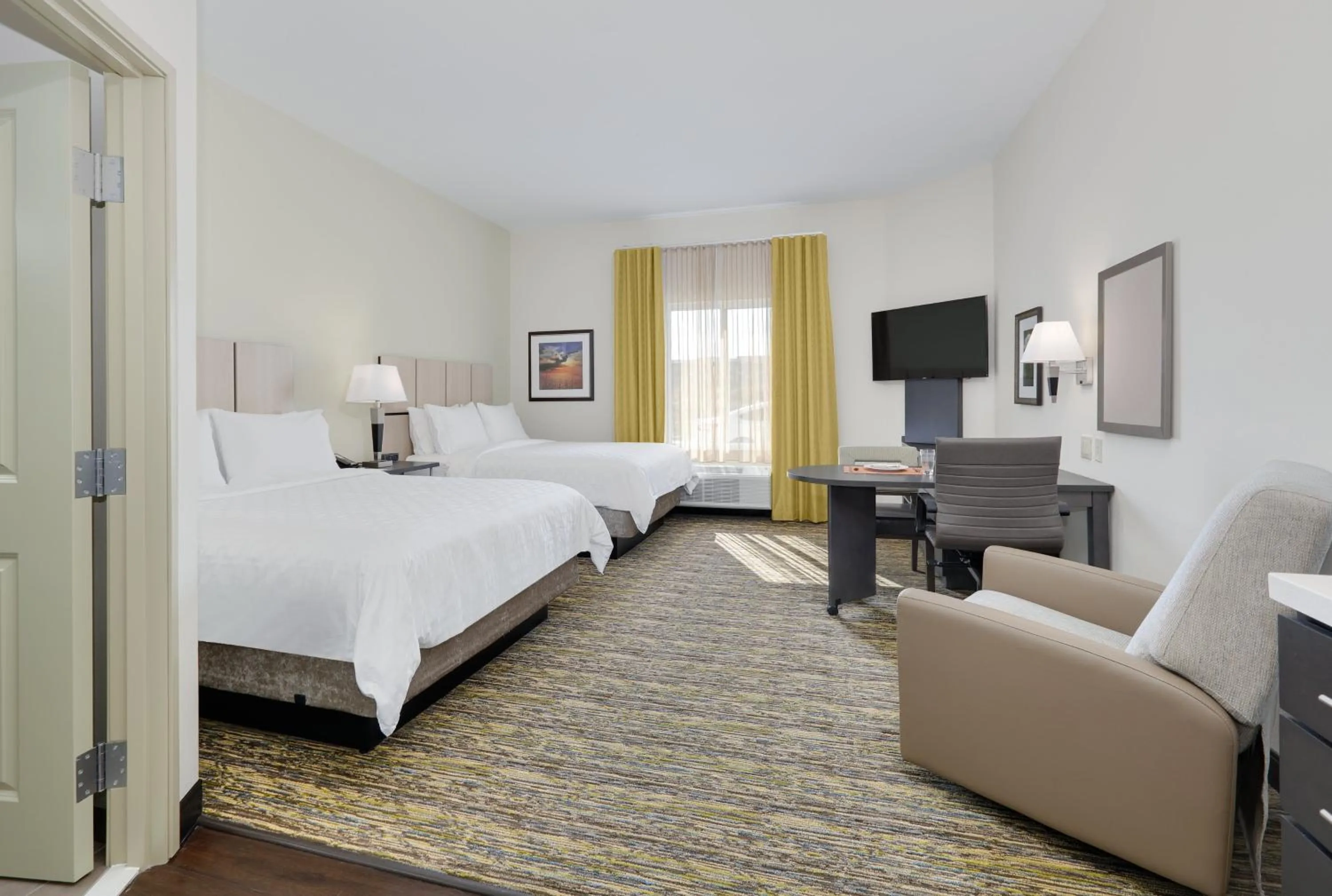 Photo of the whole room, Bed in Candlewood Suites Dallas NW - Farmers Branch by IHG