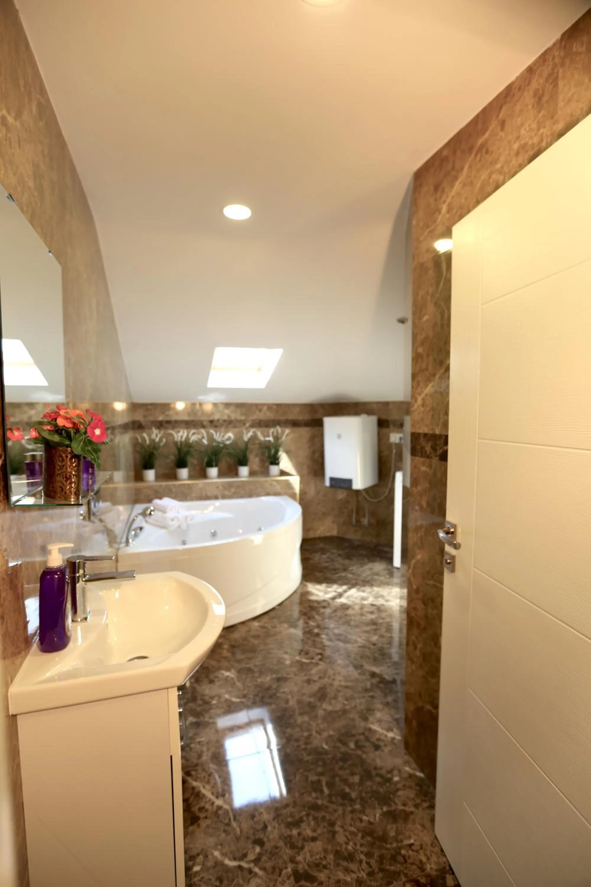 Shower in Truemar Hotels & Suites