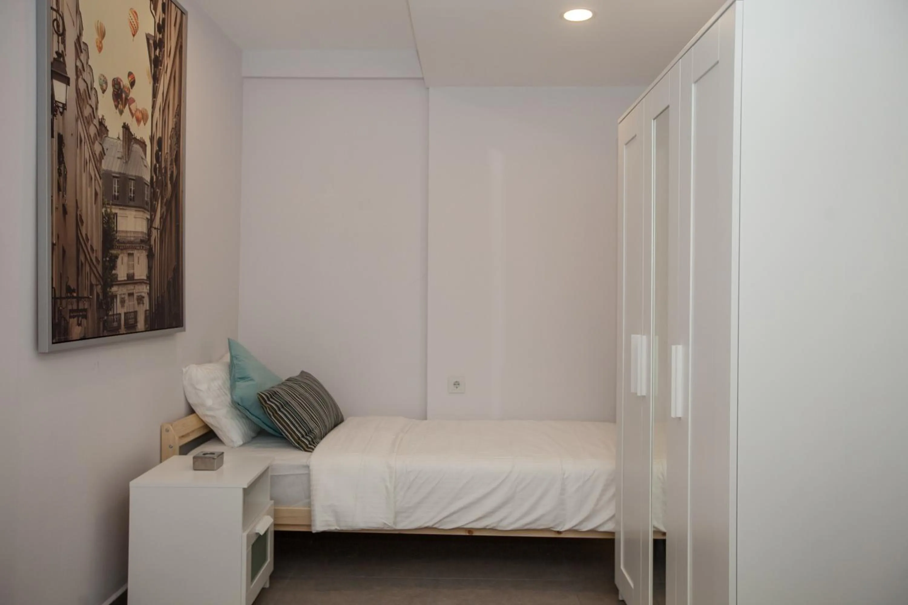 Bed in Truemar Hotels & Suites