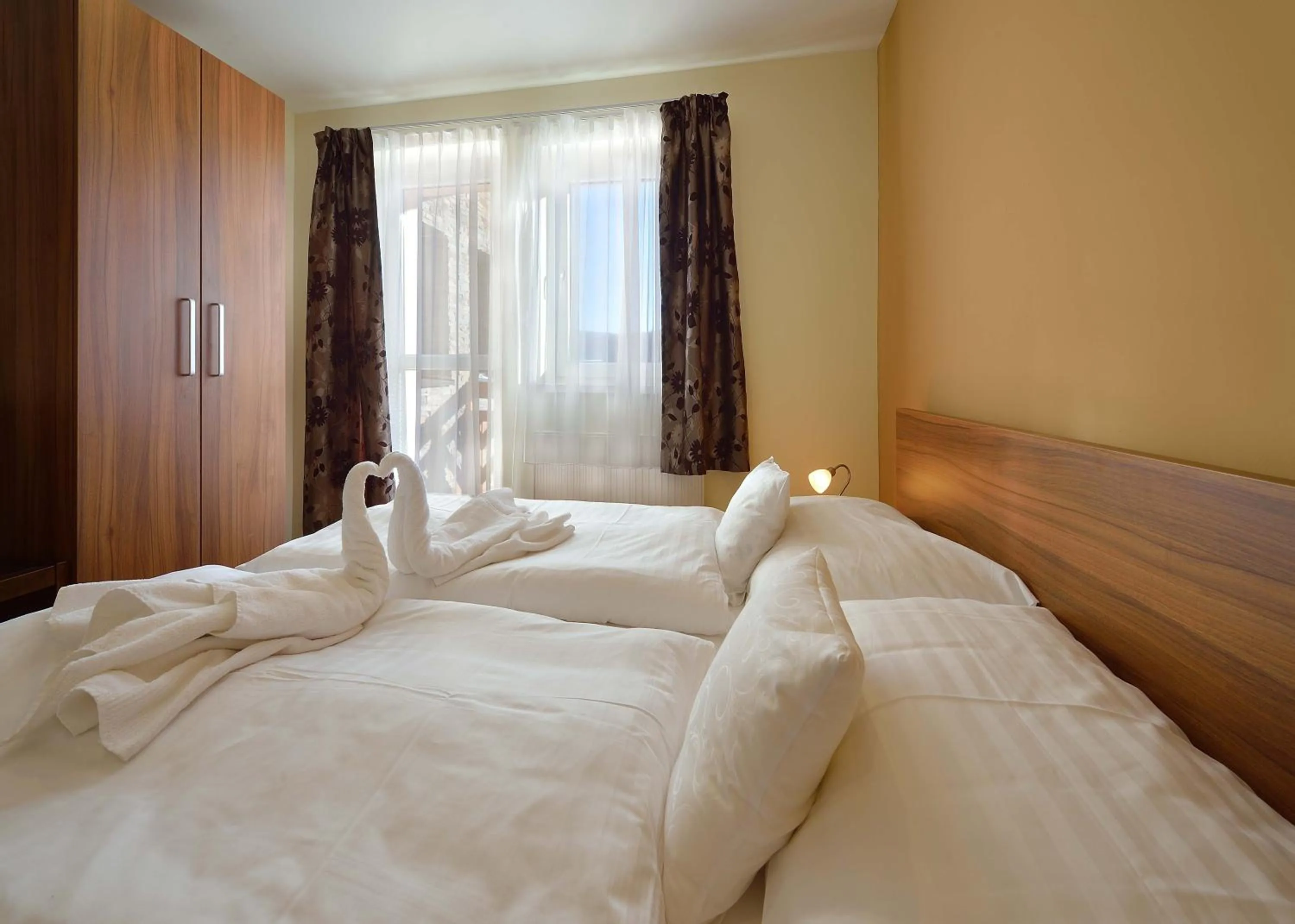 Bed in Villa Gloria Rooms & Apartments