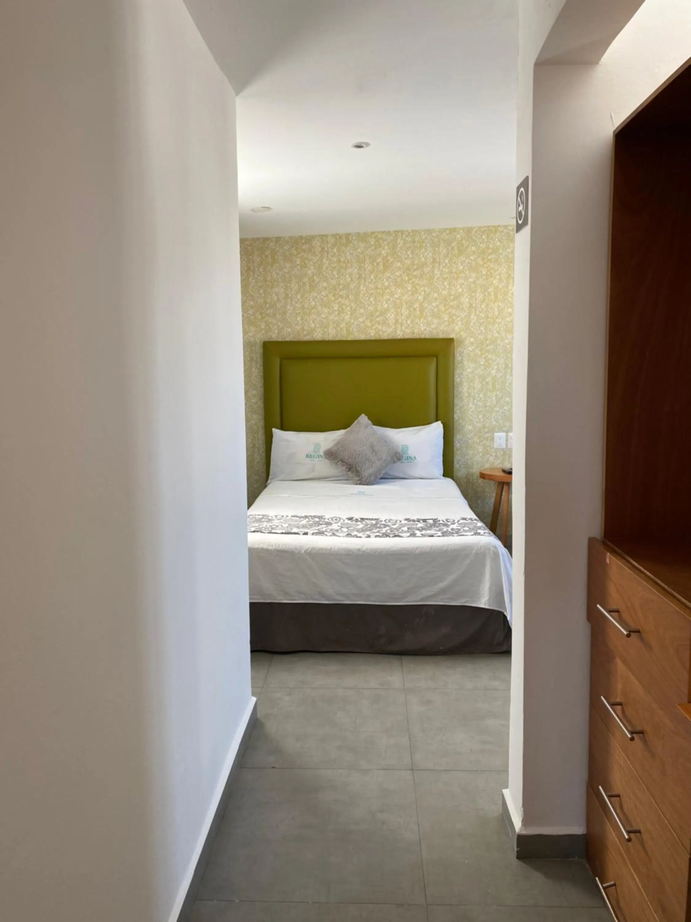 Bed in Hotel Suites Regina