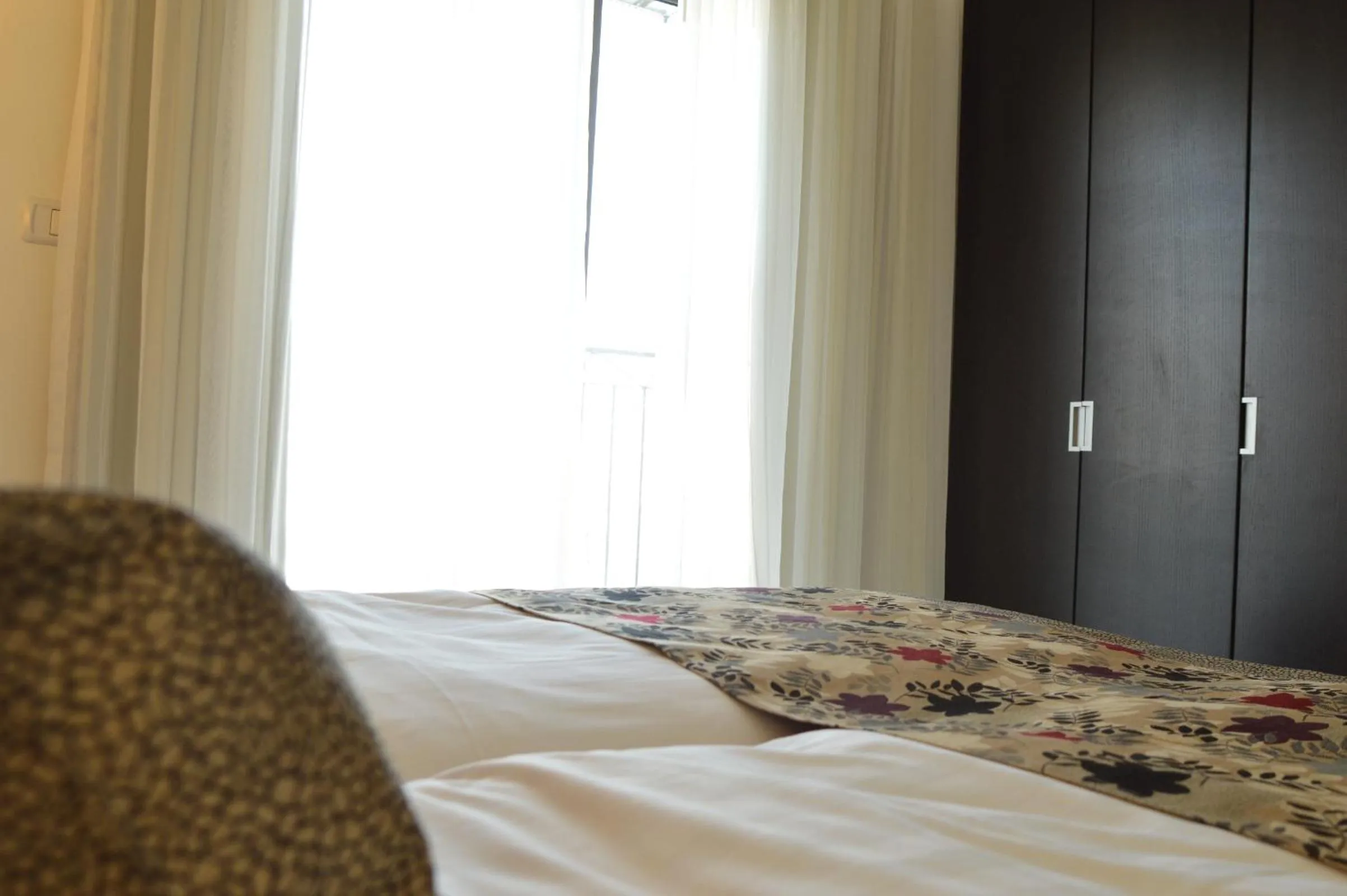 Bed in Shamai Suites Jerusalem