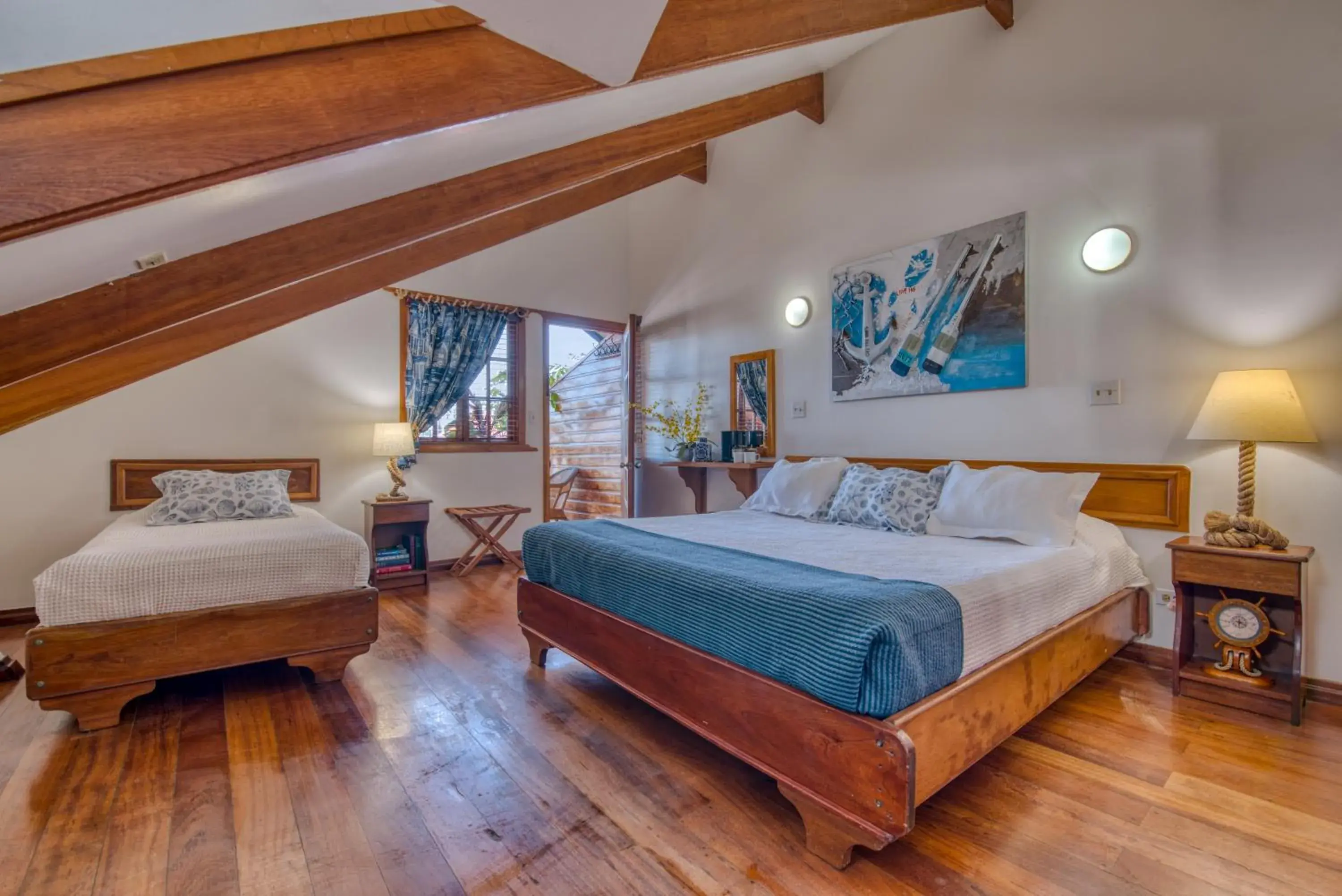 Premium Town Balcony Room with King and Single Bed in Hotel Bocas del Toro Premium Town Balcony Room with King and Single Bed in Hotel Bocas del Toro