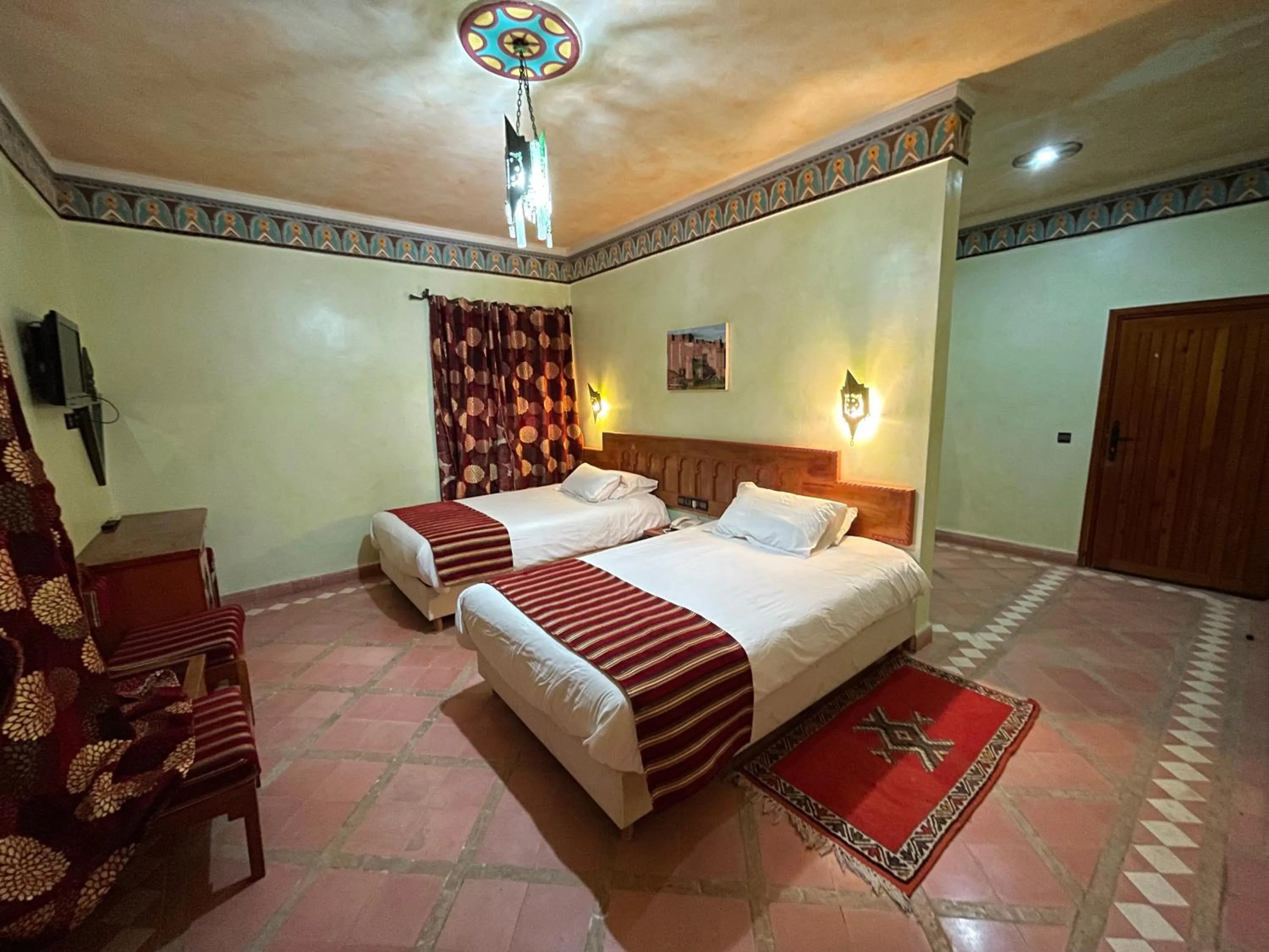 Bed in Hotel Kasbah Lamrani