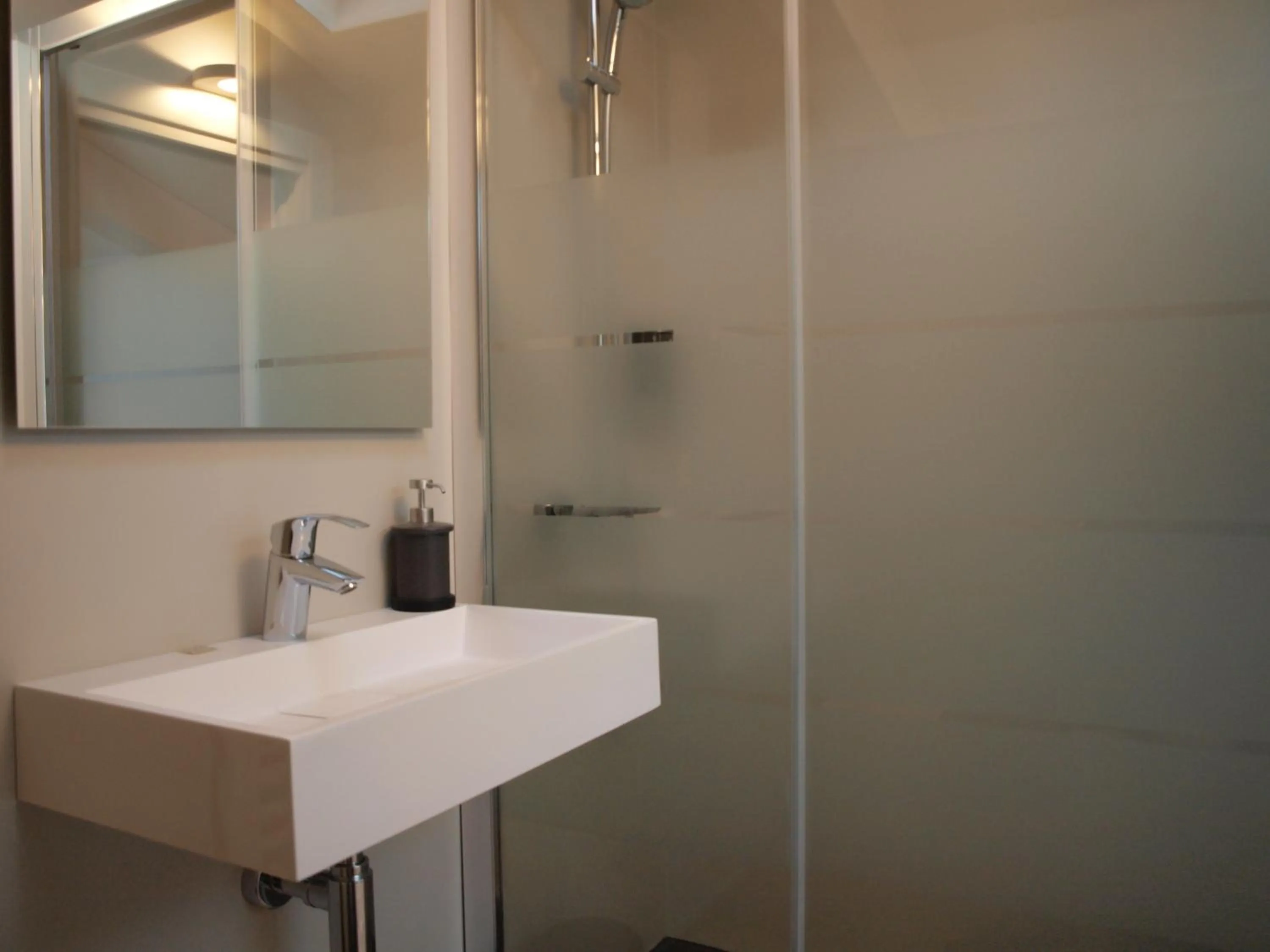 Bathroom in Acquaderni Rooms