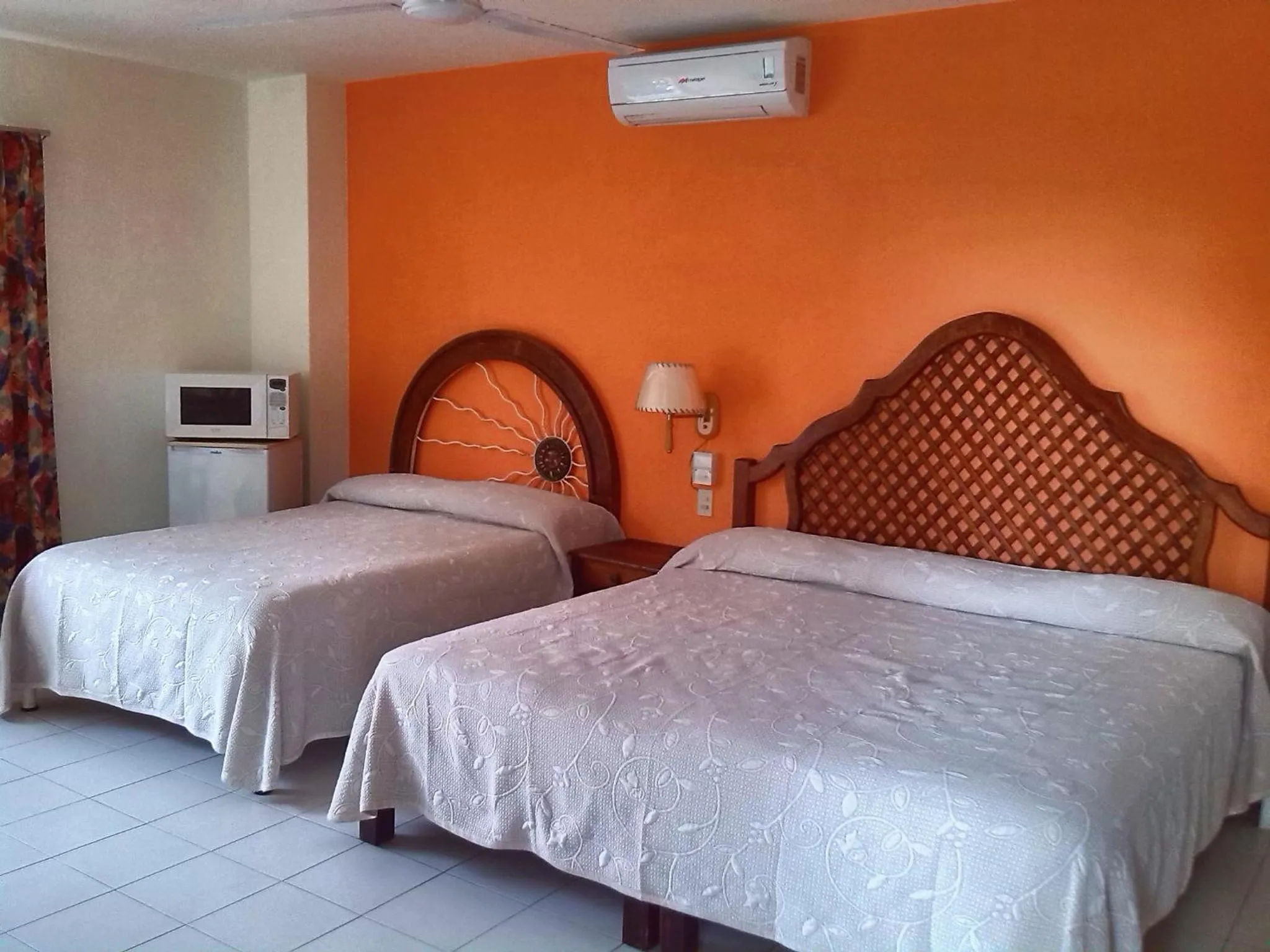 Bedroom, Bed in Hotel y Suites Corita