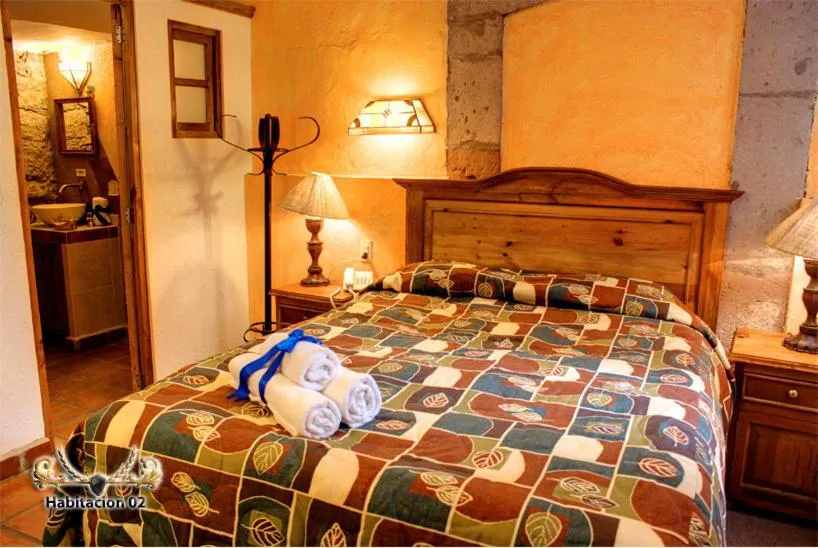 Bedroom in Hotel Casa del Anticuario