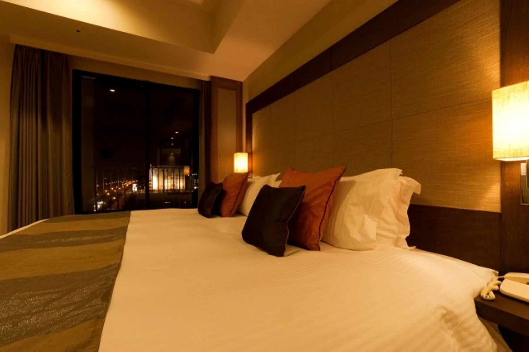 Bed in Moon Ocean Ginowan Hotel & Residence