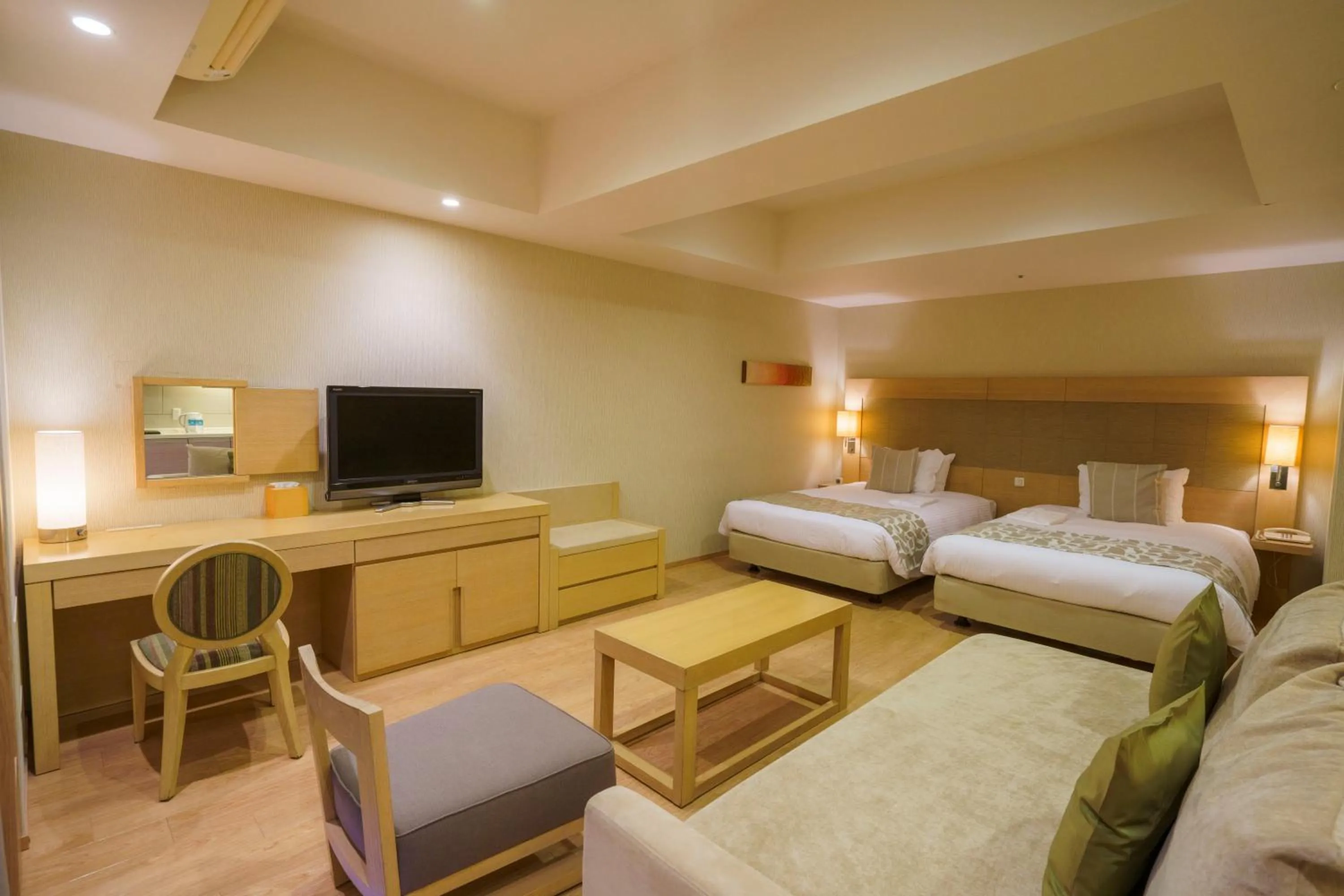 Bed in Moon Ocean Ginowan Hotel & Residence