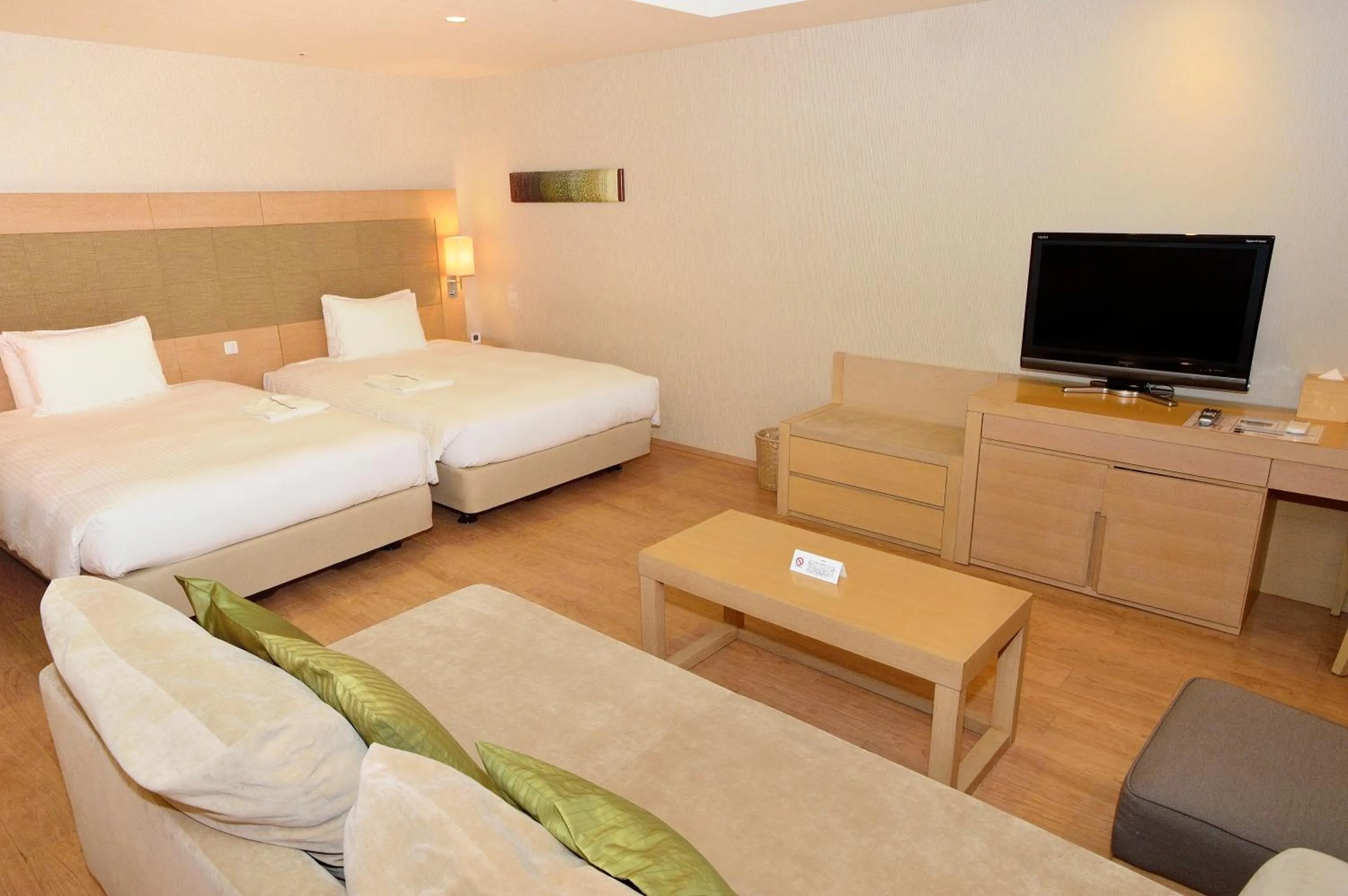 Bed in Moon Ocean Ginowan Hotel & Residence