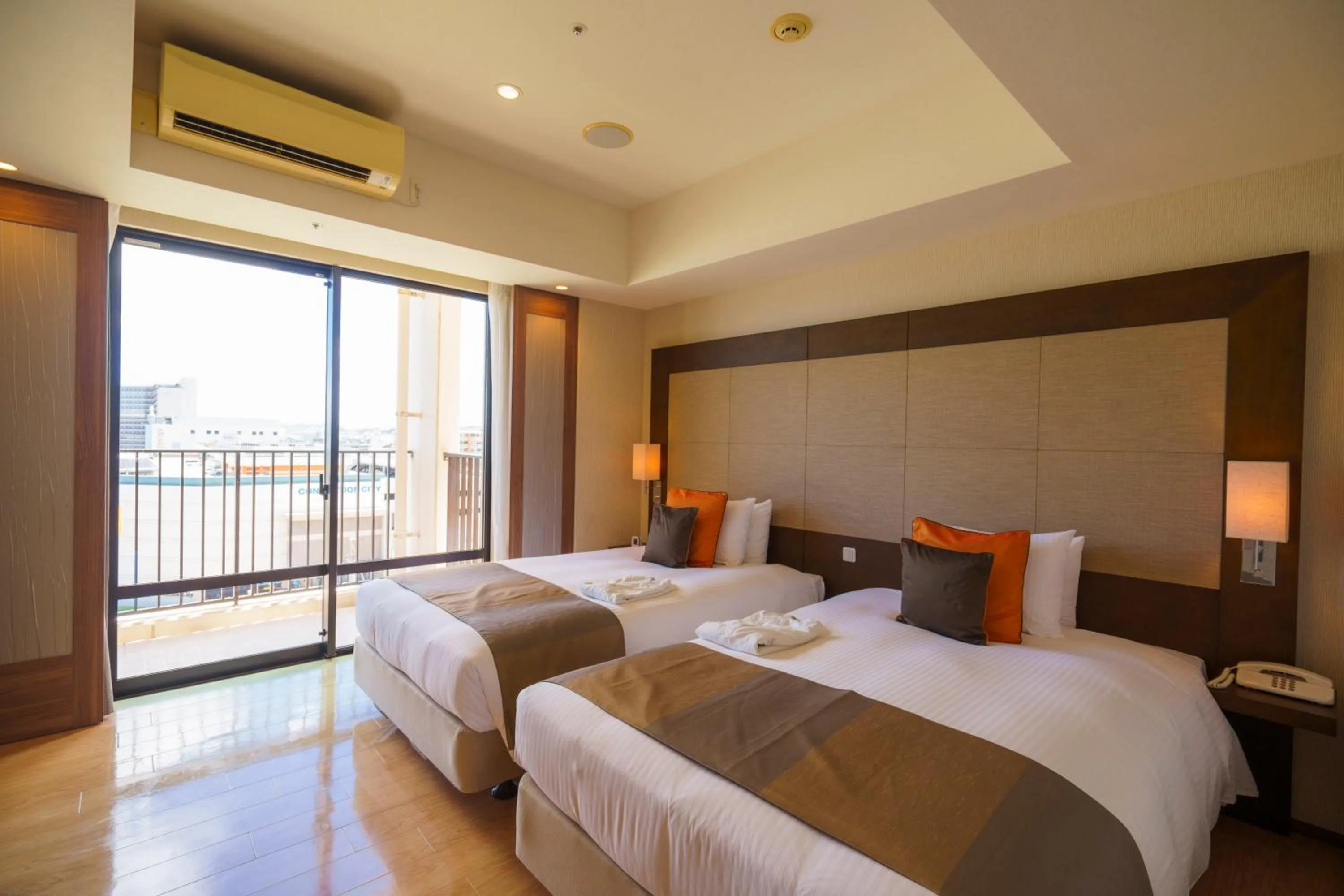 Bed in Moon Ocean Ginowan Hotel & Residence