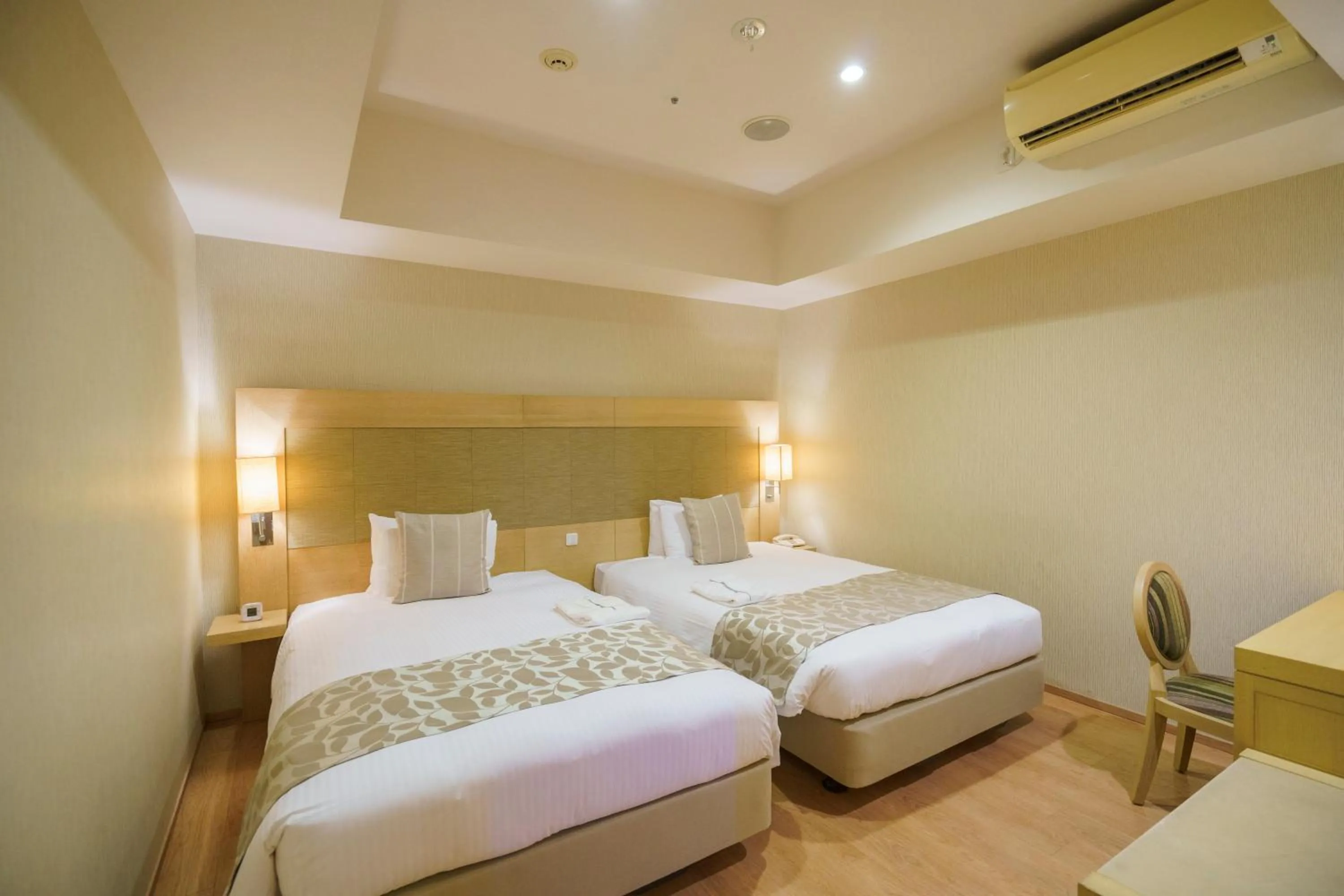 Bed in Moon Ocean Ginowan Hotel & Residence