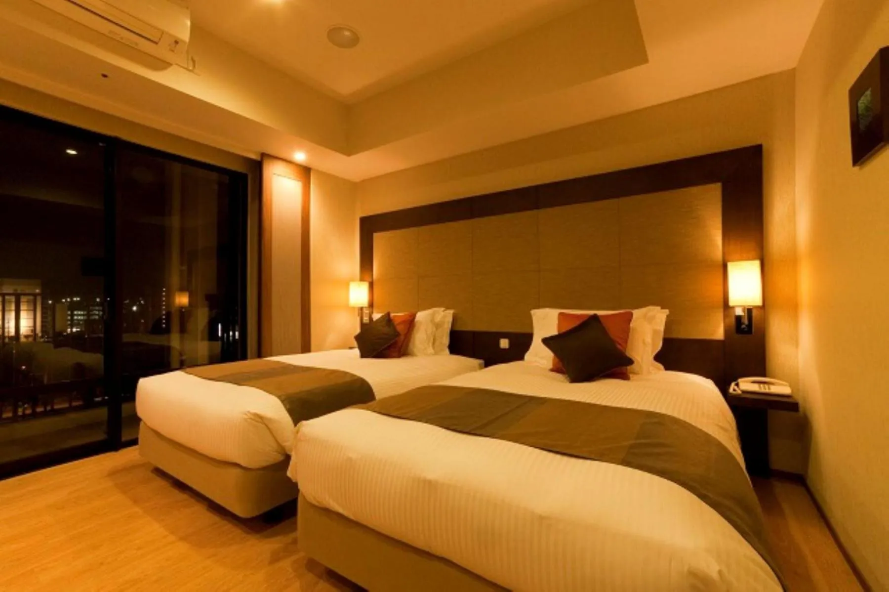 Bed in Moon Ocean Ginowan Hotel & Residence