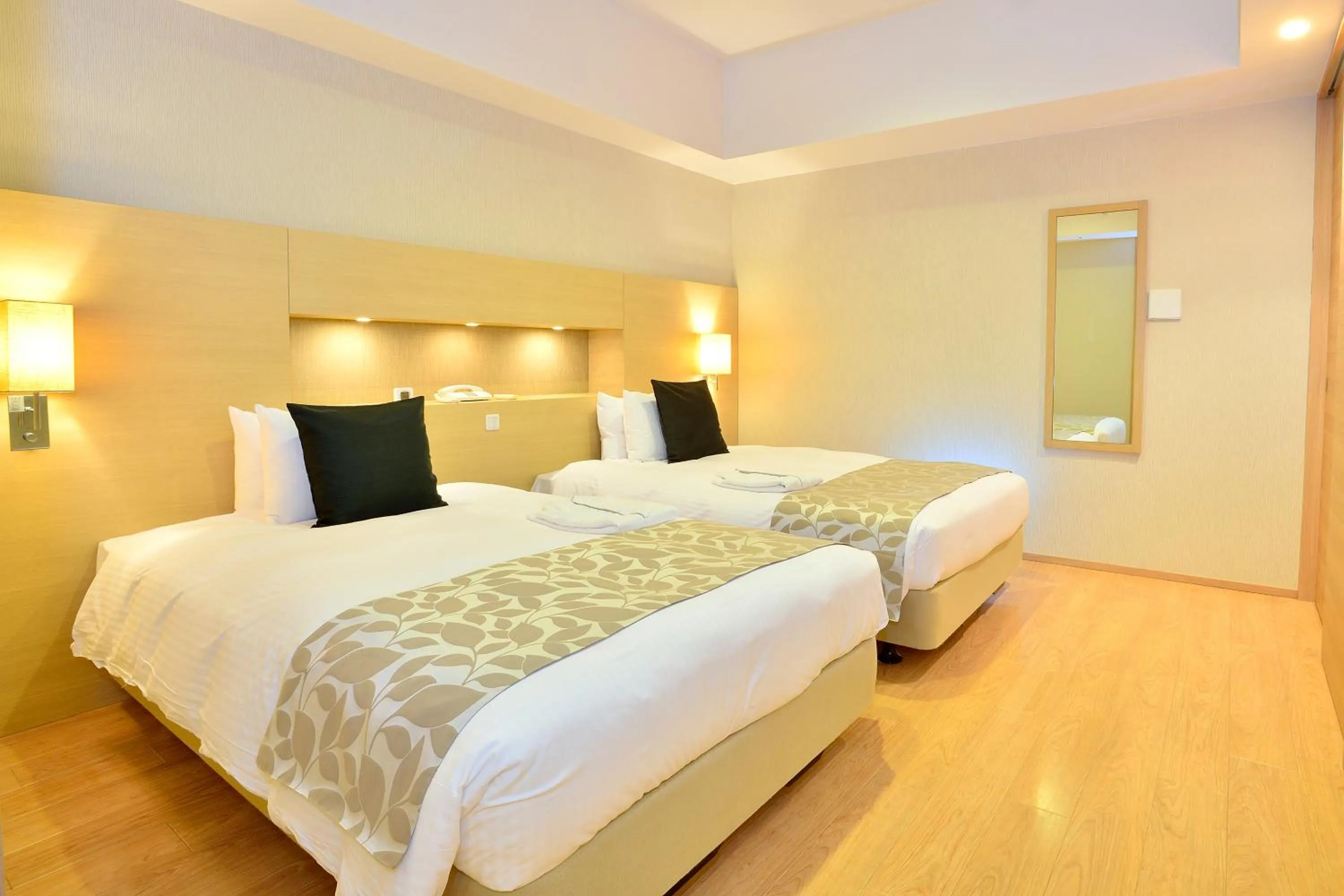 Bed in Moon Ocean Ginowan Hotel & Residence