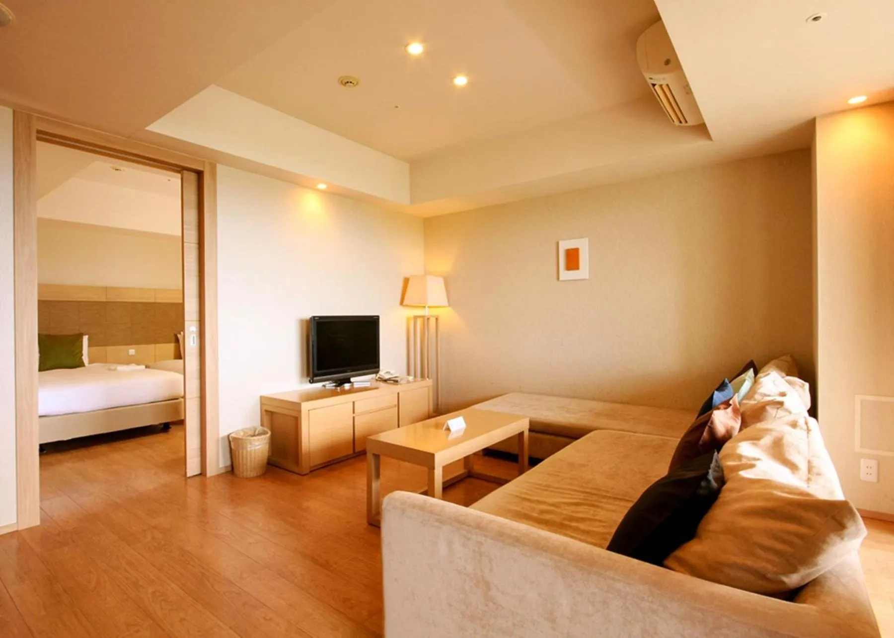 Living room, Bed in Moon Ocean Ginowan Hotel & Residence