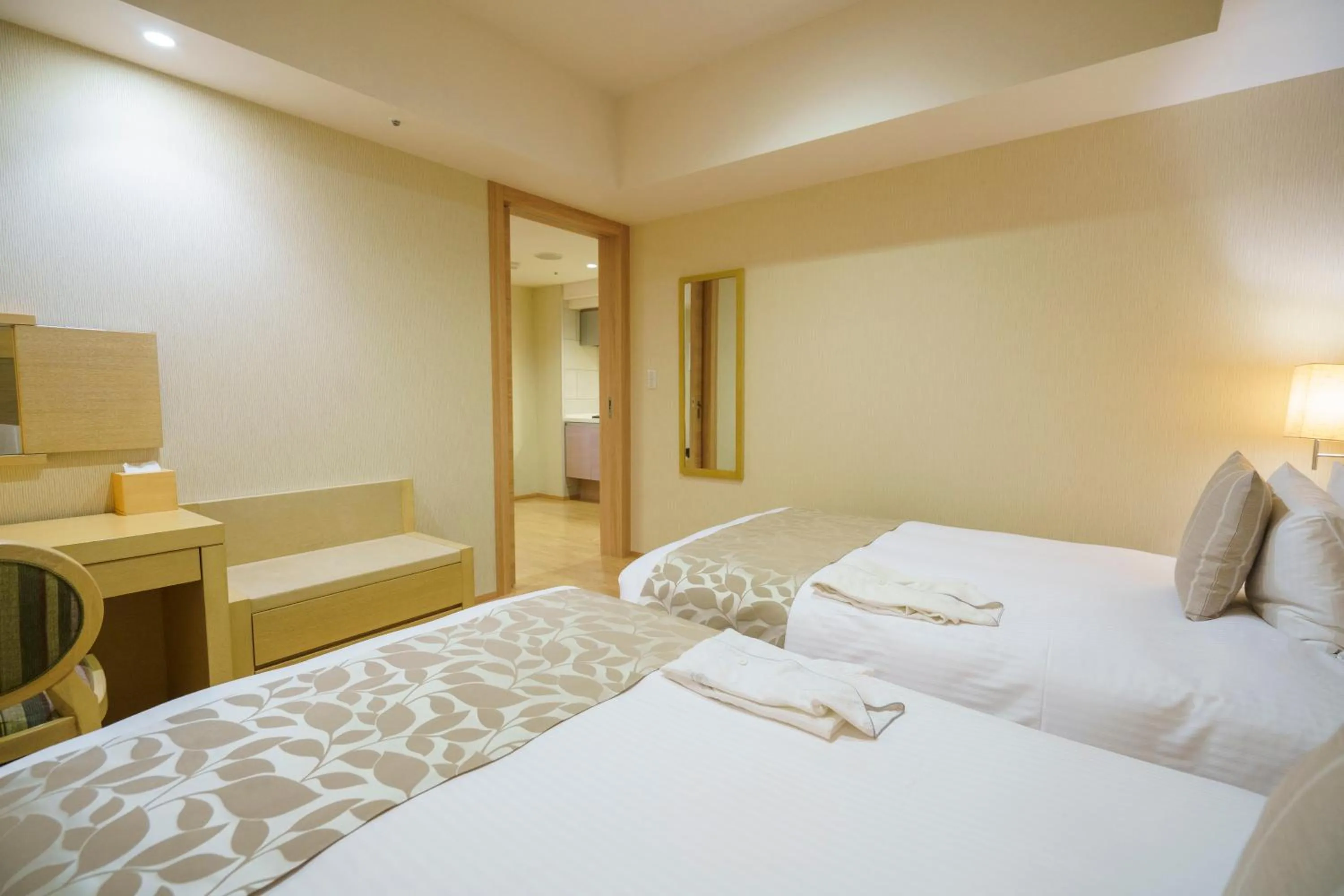 Bed in Moon Ocean Ginowan Hotel & Residence