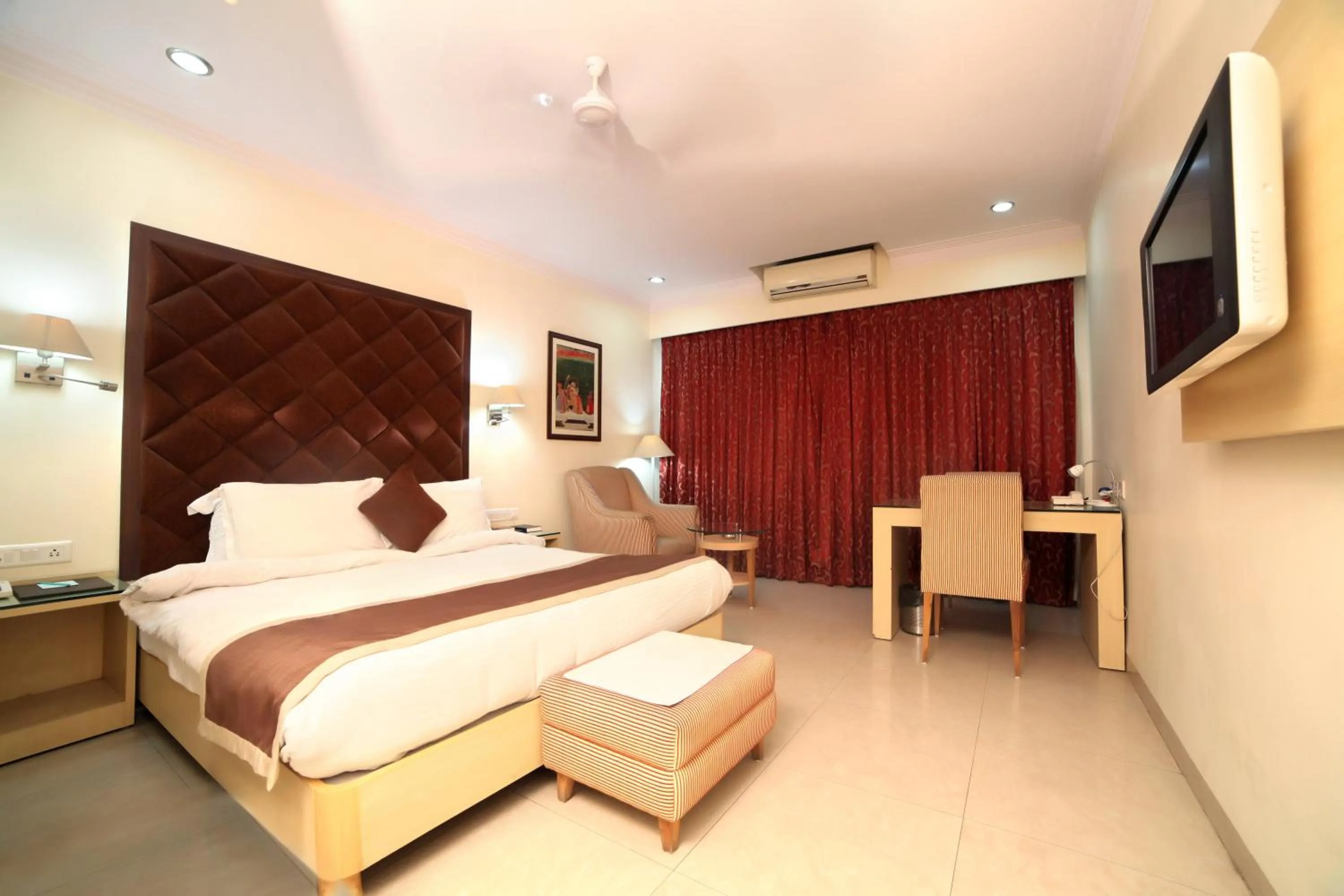 Photo of the whole room, Bed in Chryso Hotels Pvt Ltd