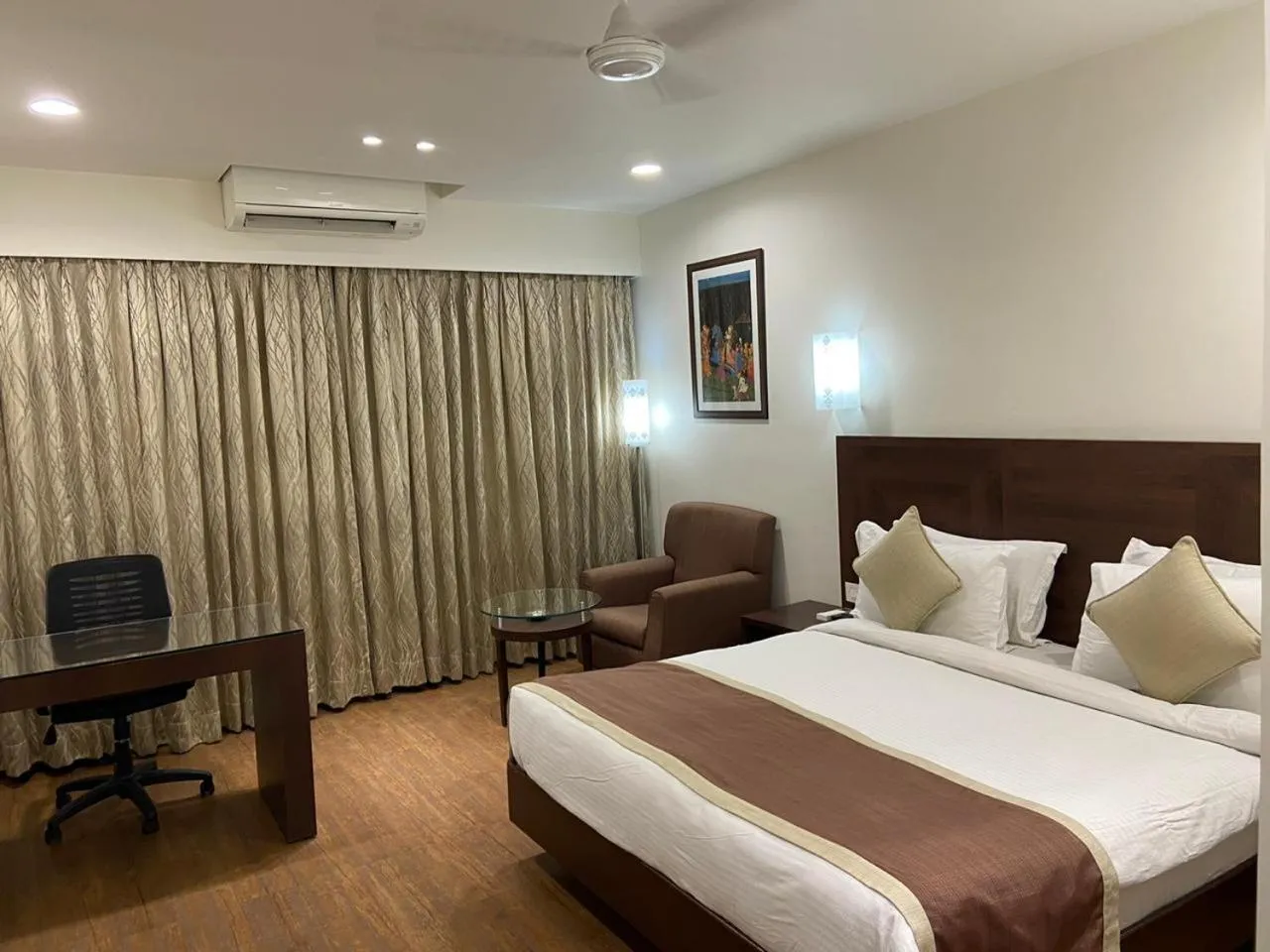 Bed in Chryso Hotels Pvt Ltd