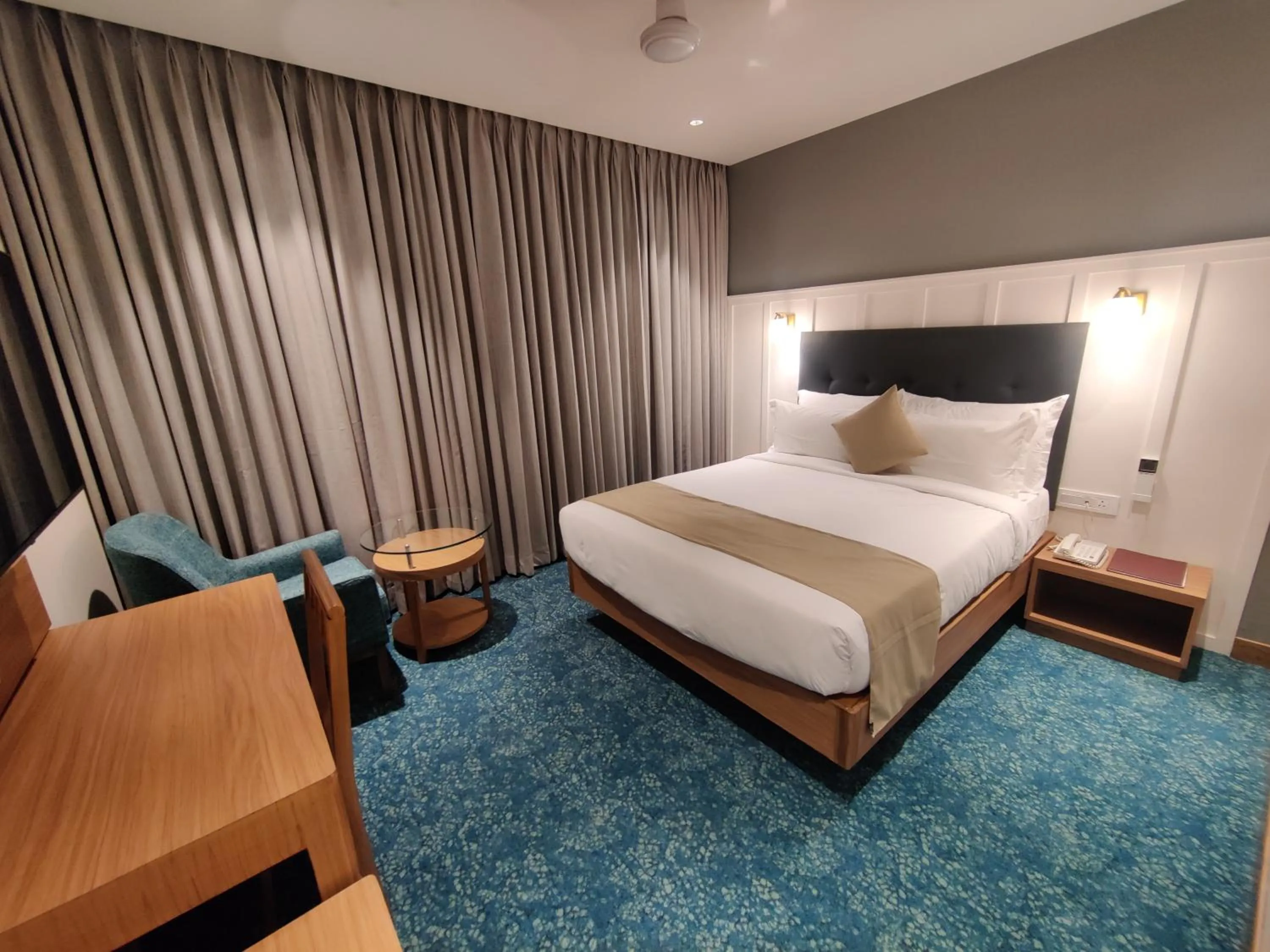 Photo of the whole room, Bed in Chryso Hotels Pvt Ltd