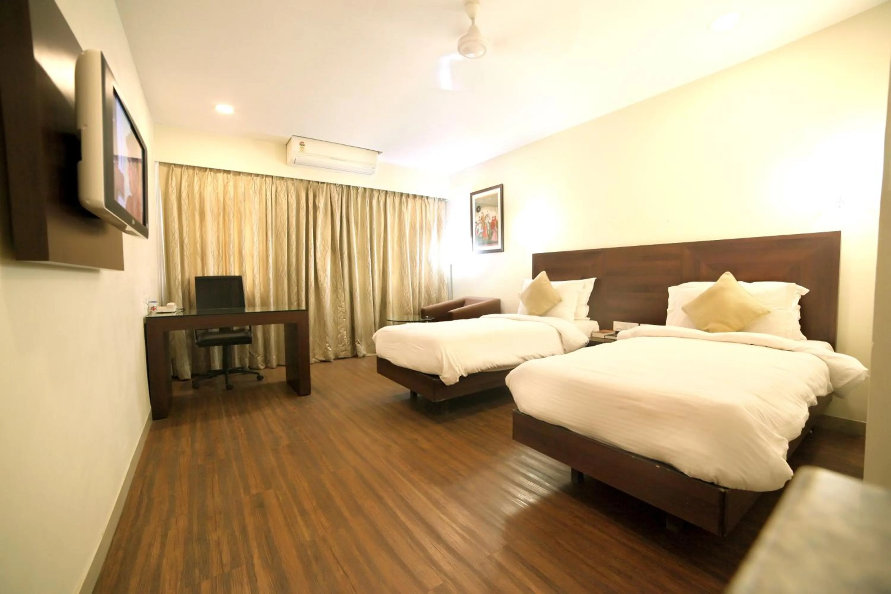 Photo of the whole room, Bed in Chryso Hotels Pvt Ltd