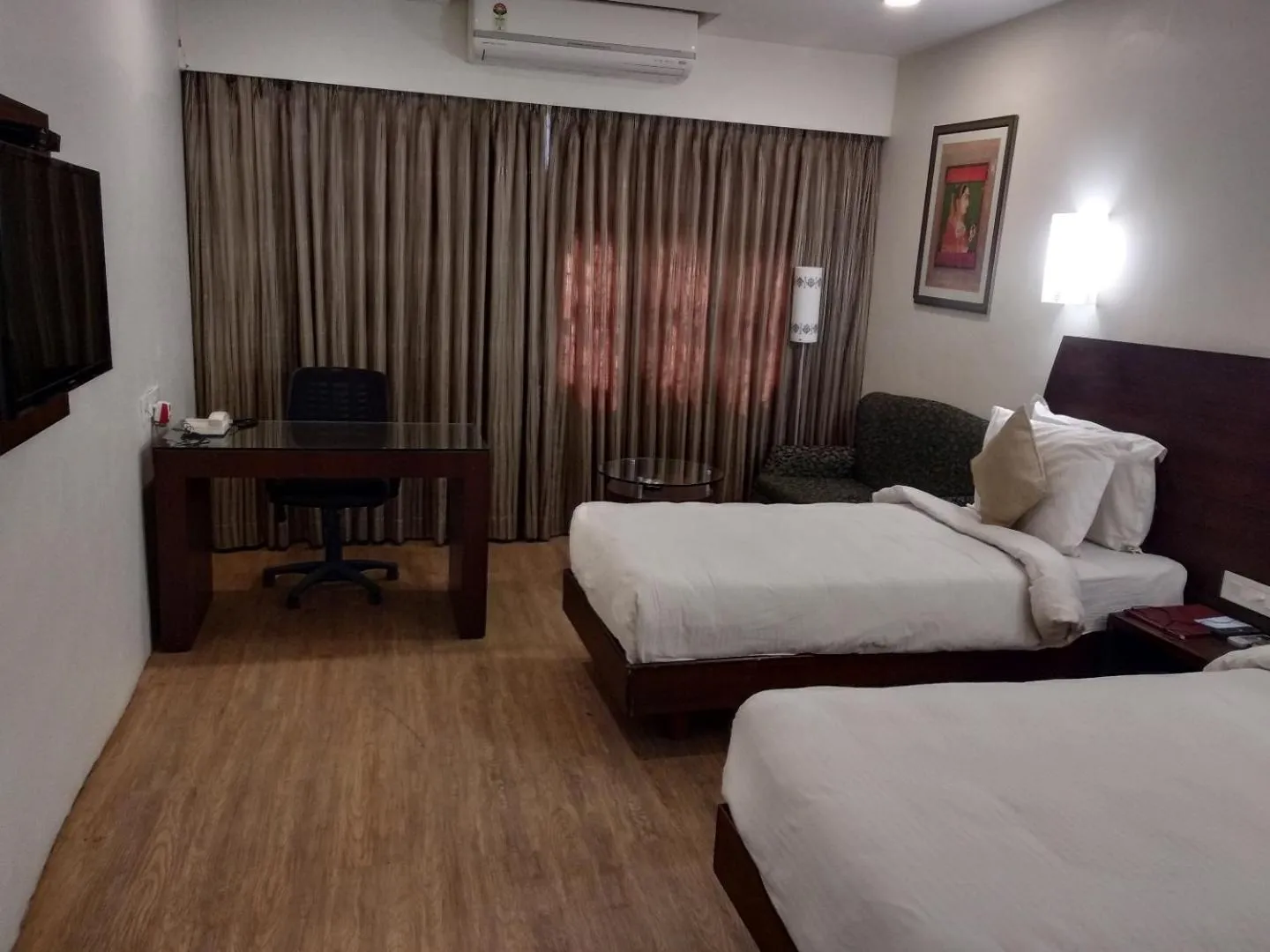 Photo of the whole room, Bed in Chryso Hotels Pvt Ltd