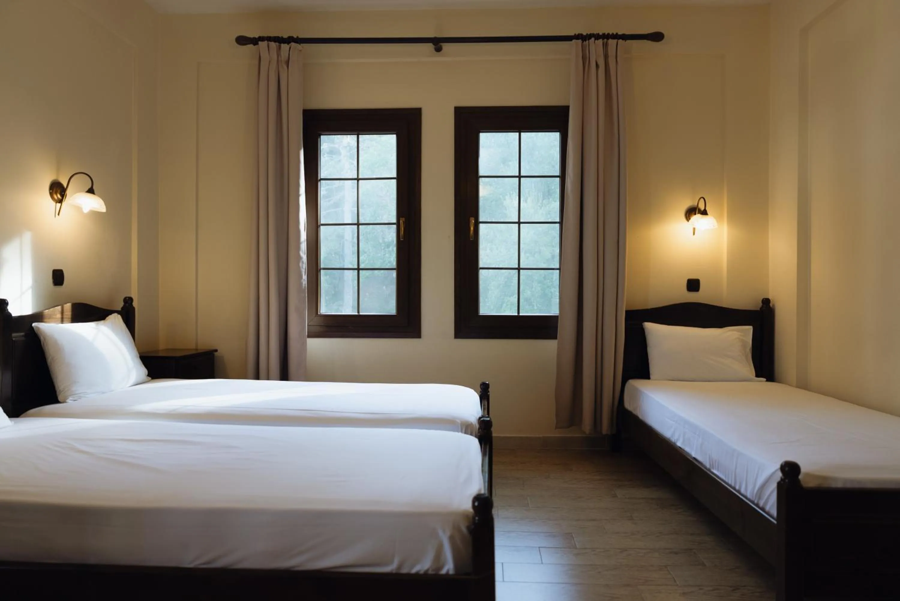 Bed in Agnanti Hotel