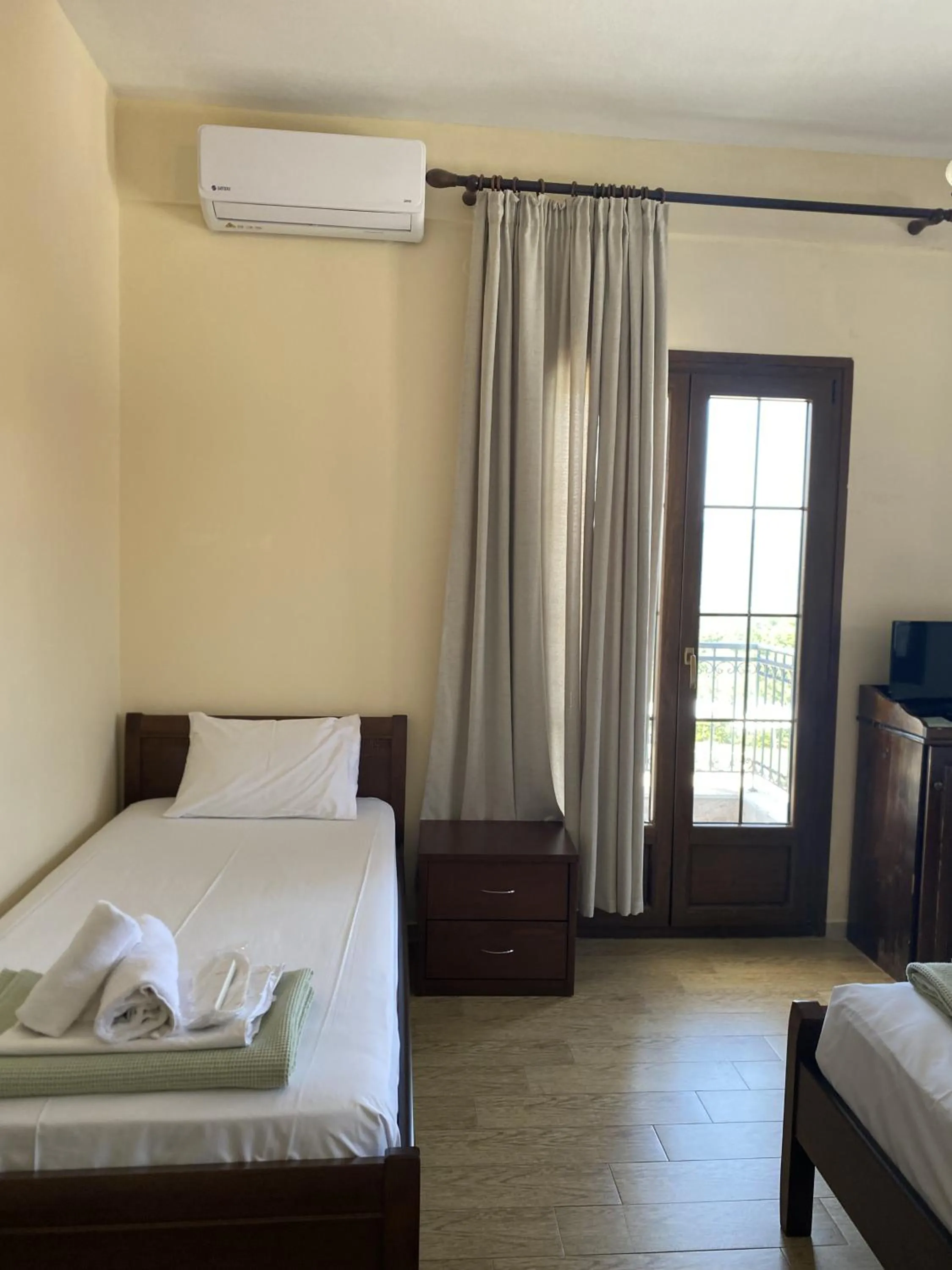 TV and multimedia, Bed in Agnanti Hotel