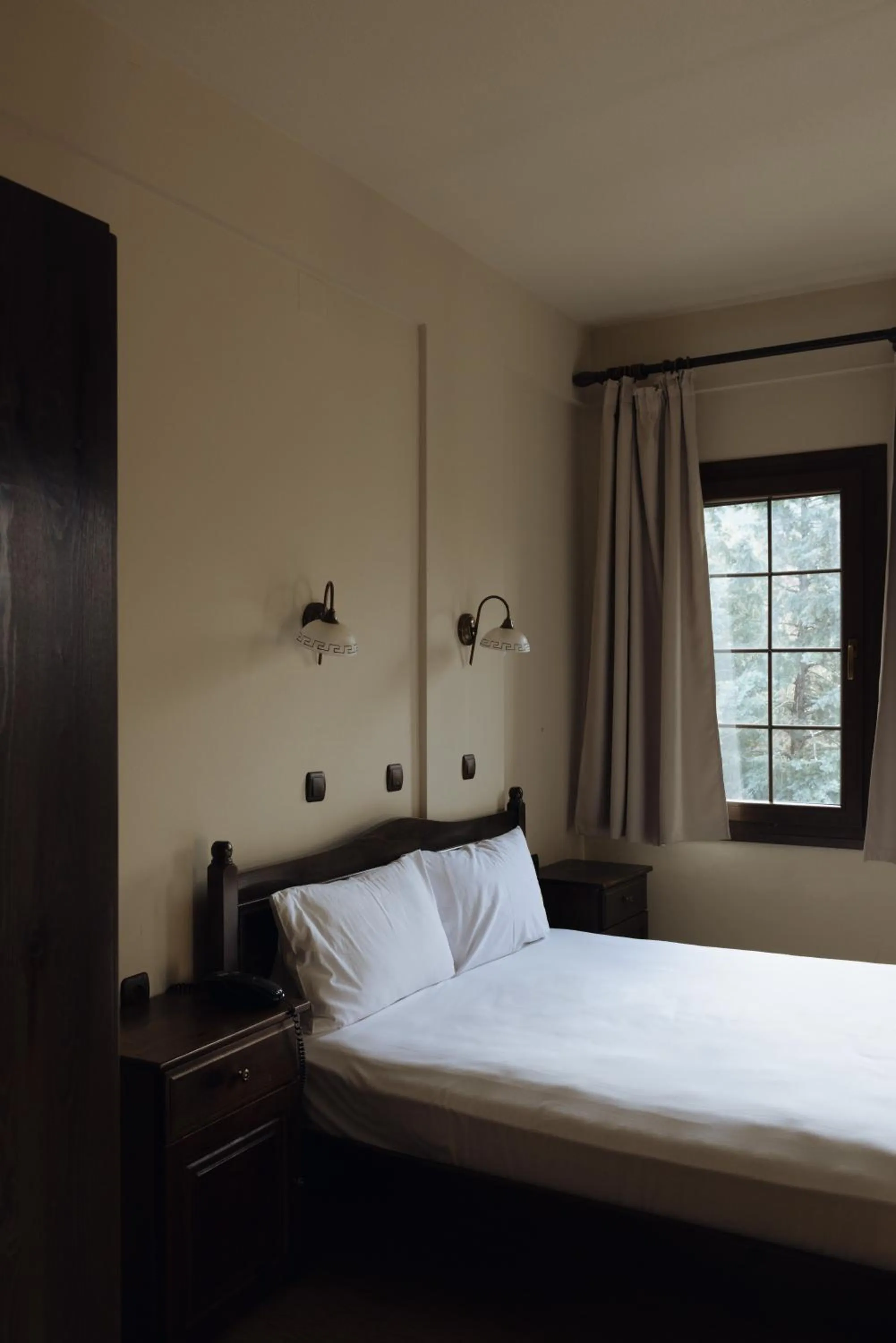 Bed in Agnanti Hotel