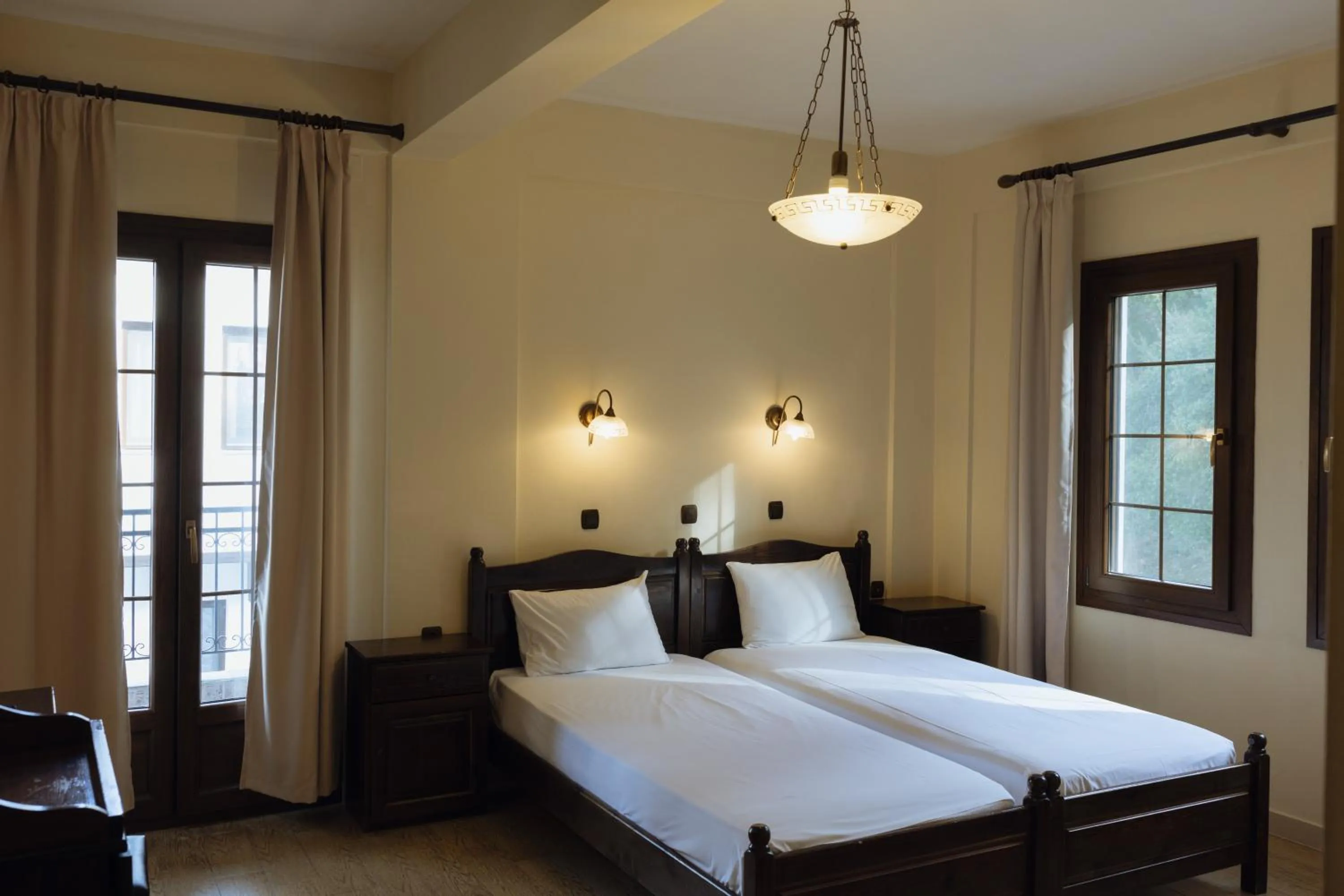 Bed in Agnanti Hotel