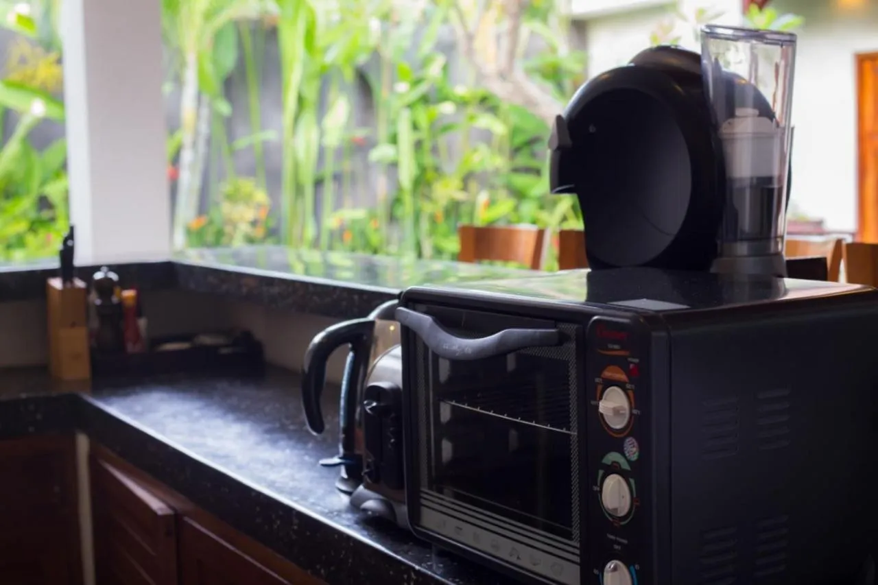 Kitchen or kitchenette in Sandi Agung Villa