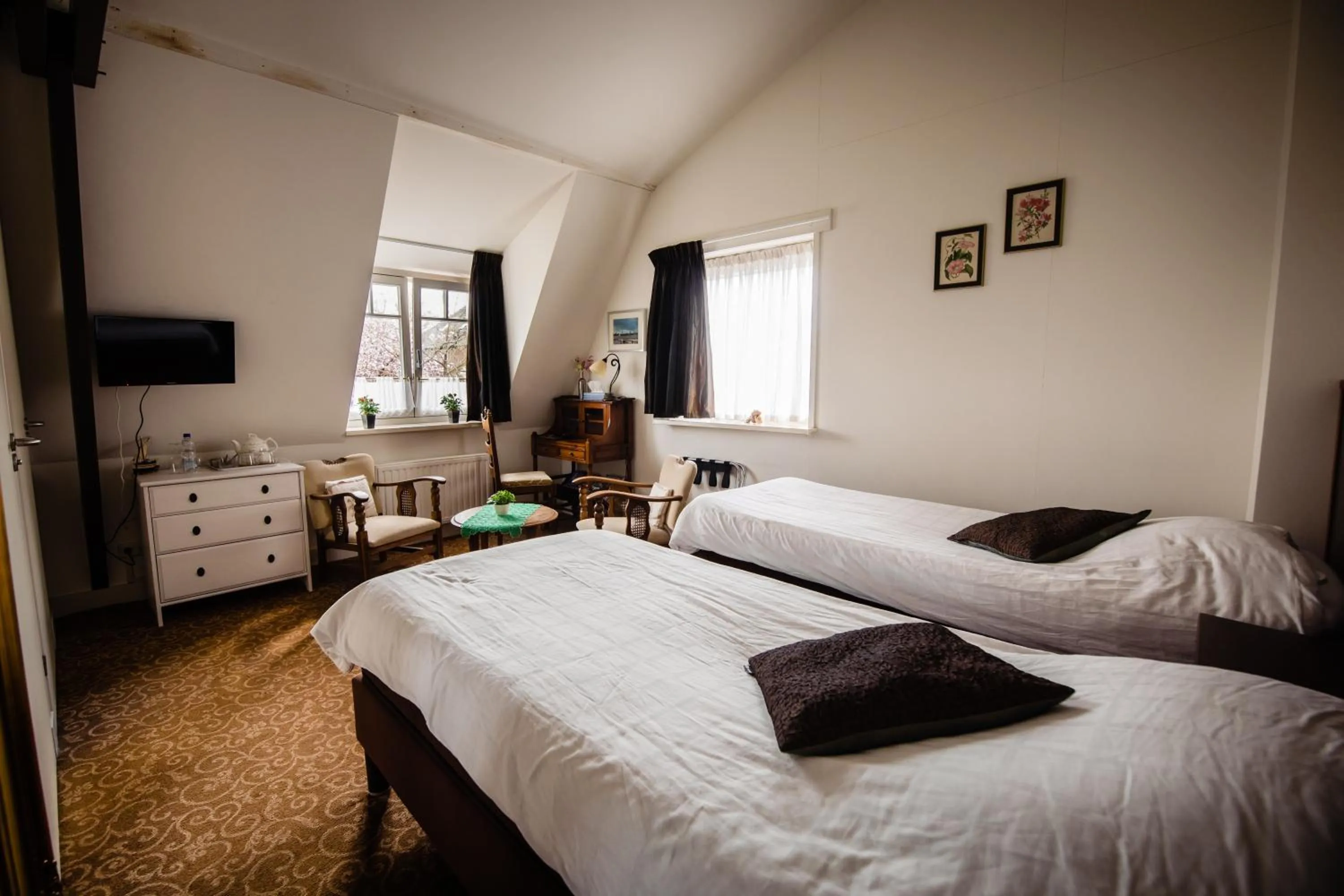 Bed in Hotel de Reiziger