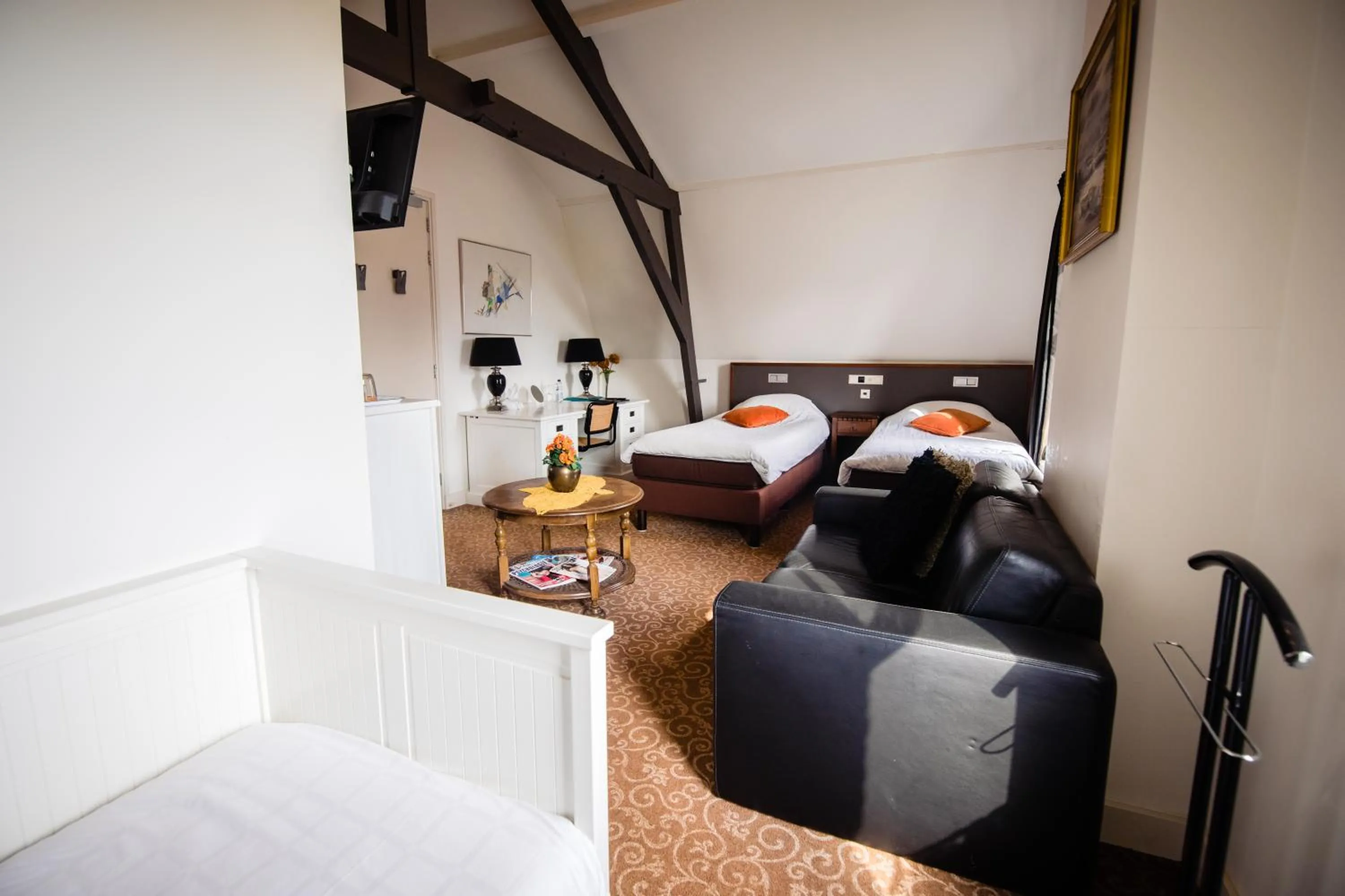 Bed in Hotel de Reiziger