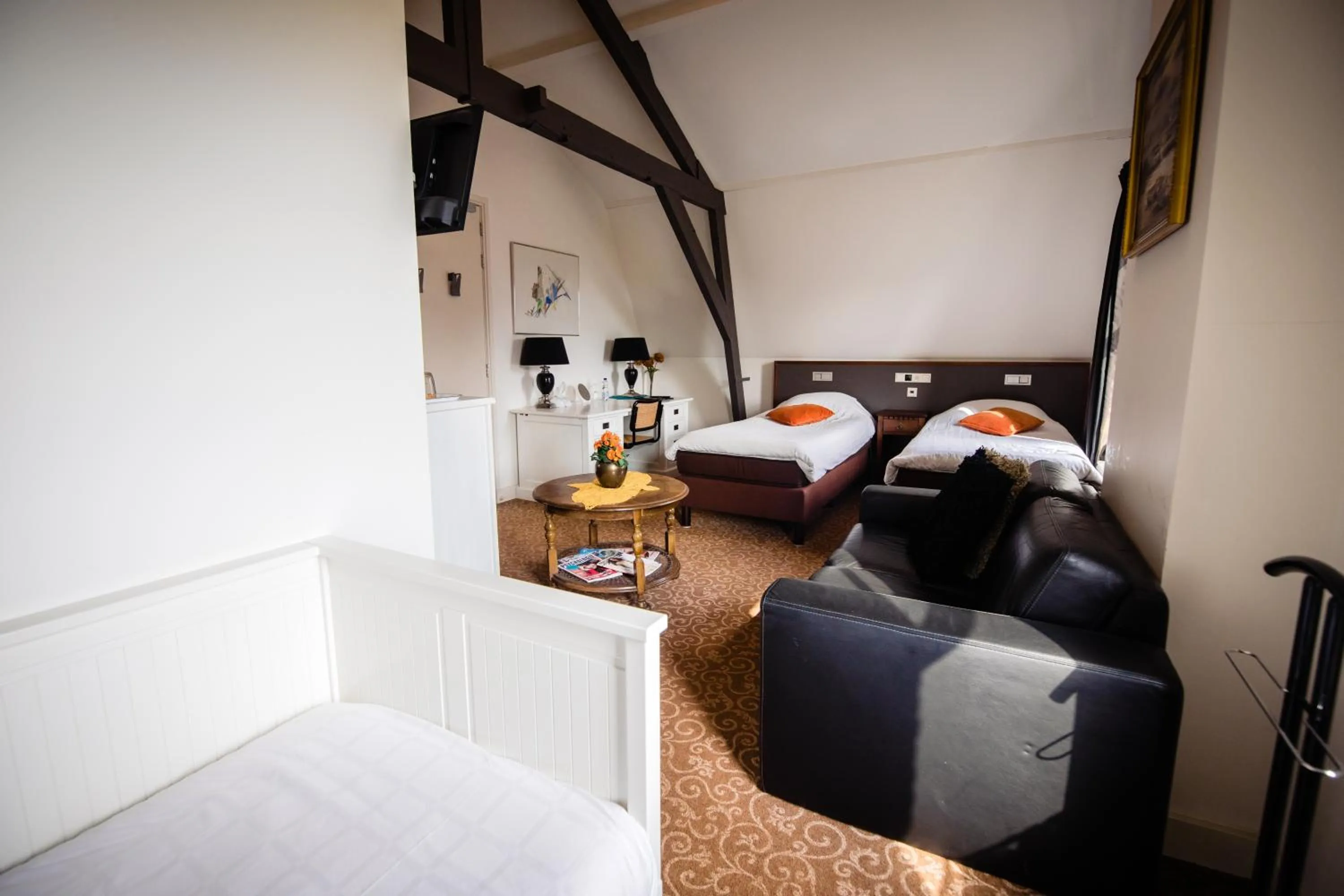 Bed in Hotel de Reiziger