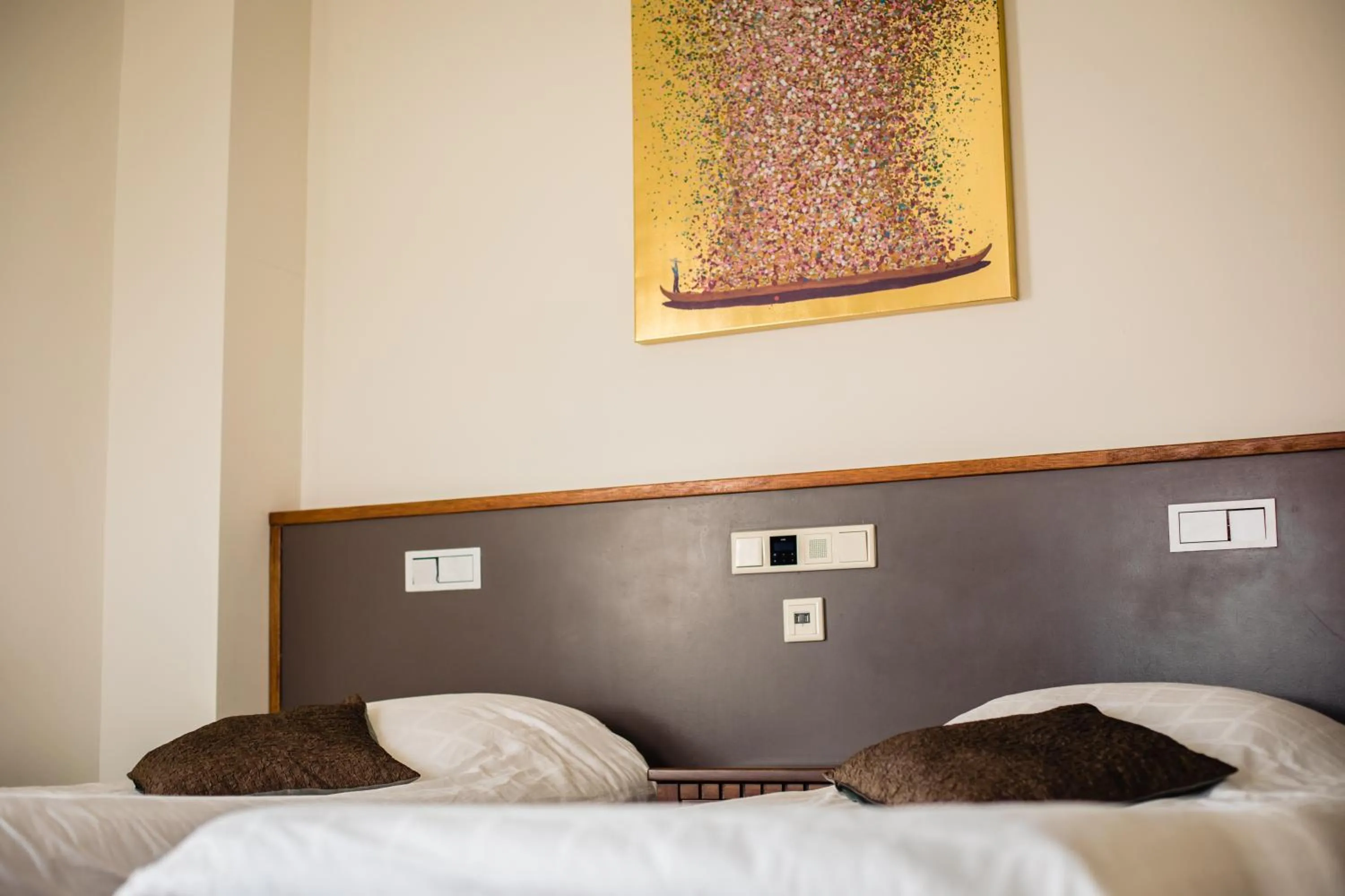 Bed in Hotel de Reiziger