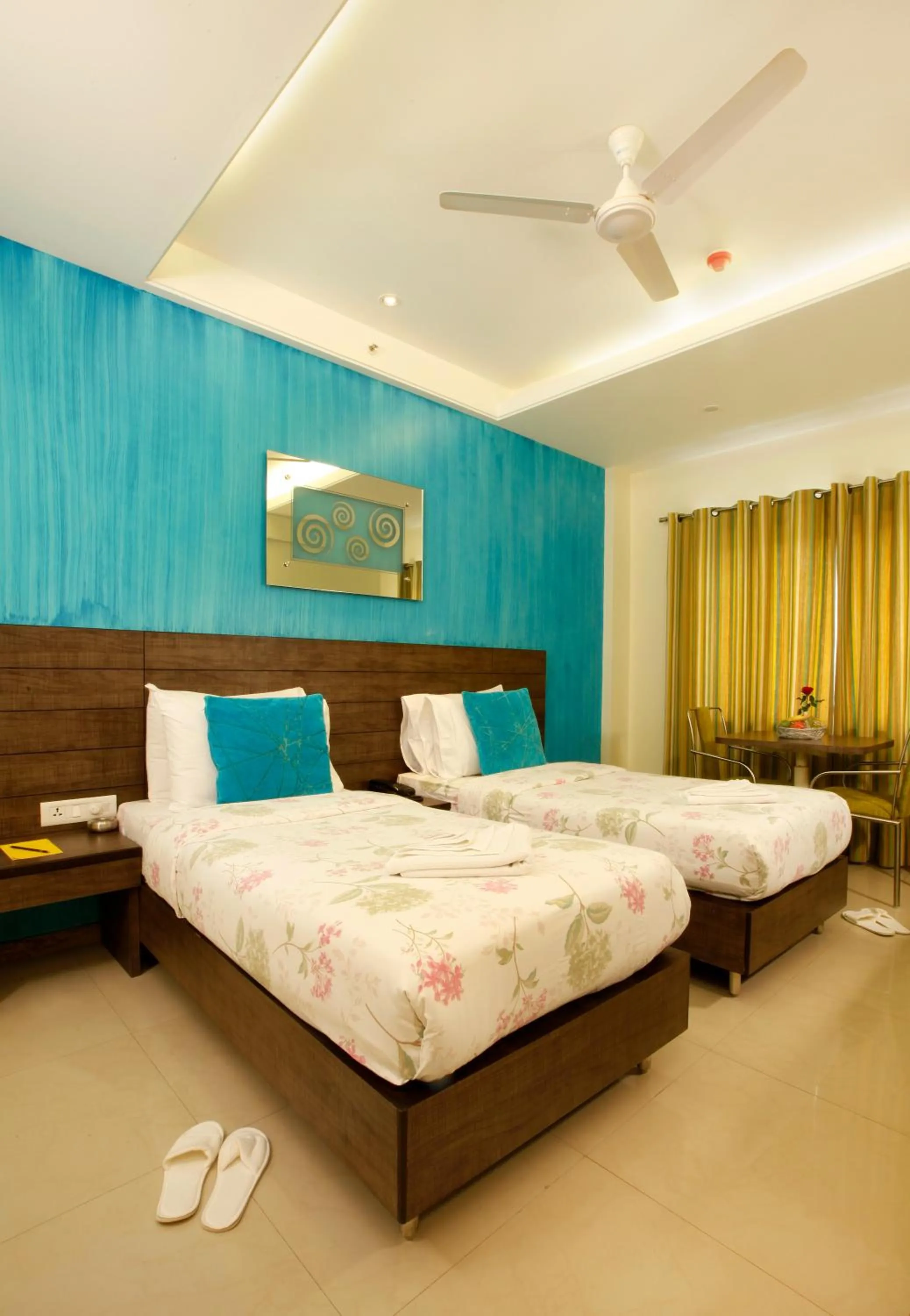 Bed in BIZZ Tamanna Hotel