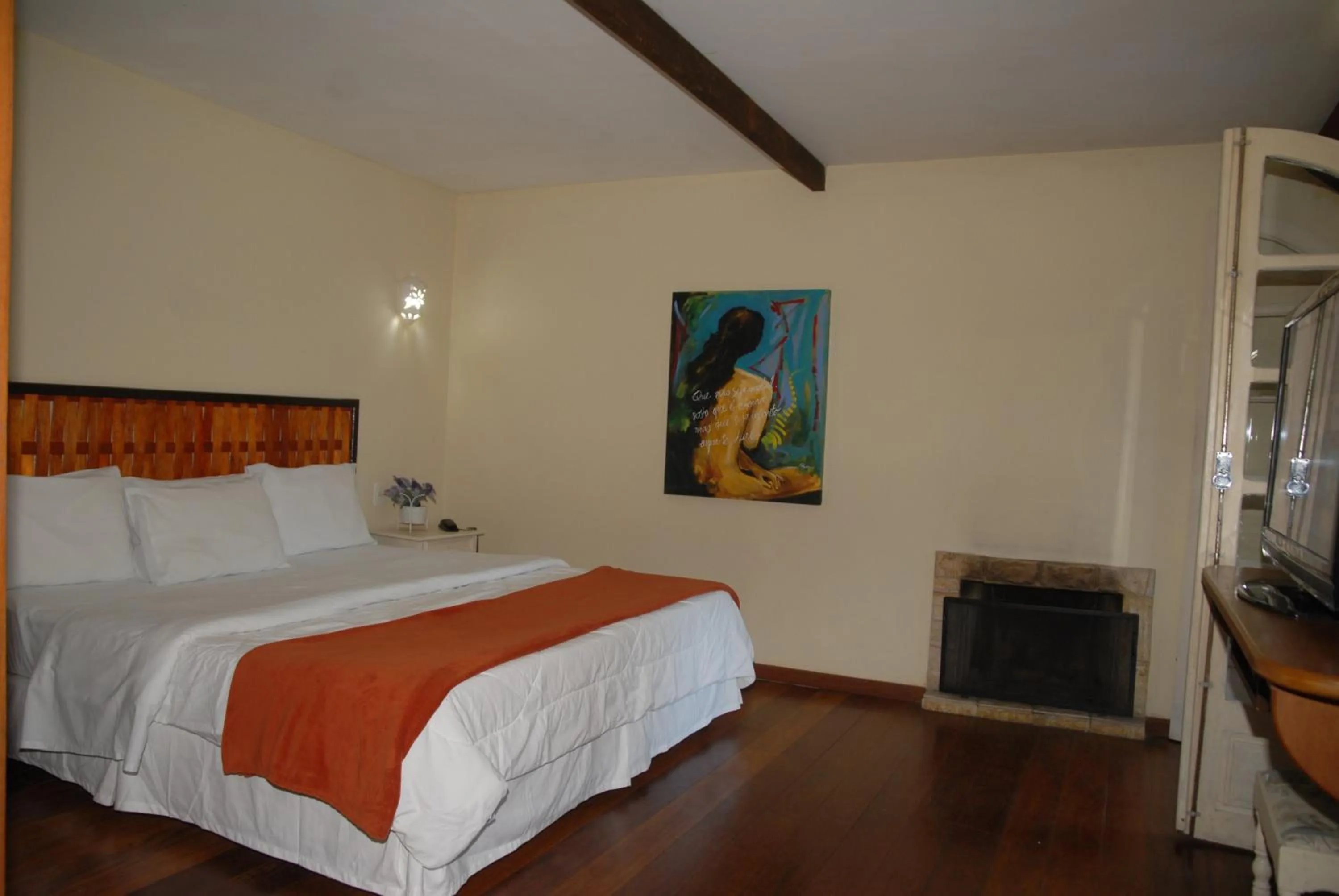 Bed in Pousada Mirante do Penedo