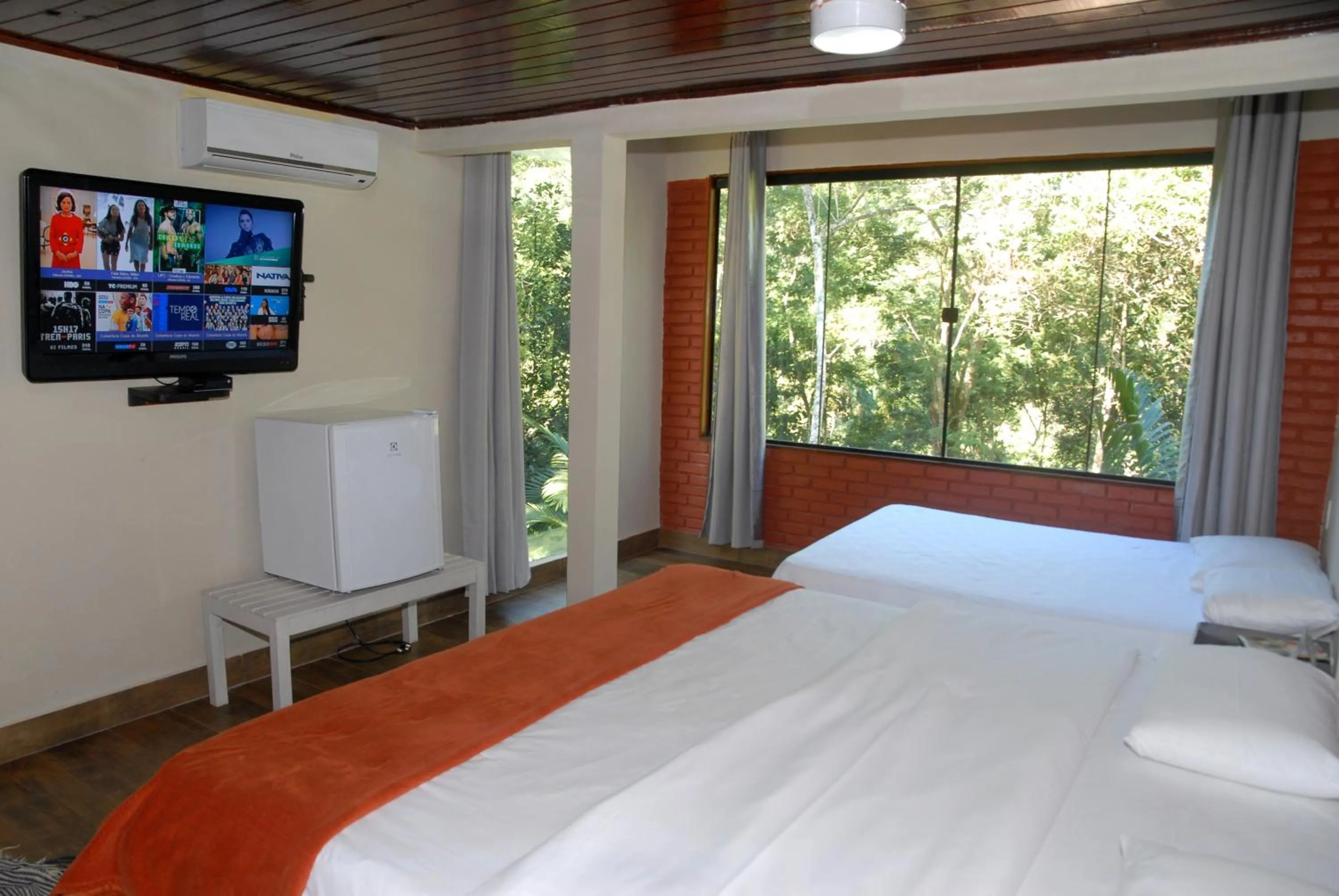 Bed in Pousada Mirante do Penedo