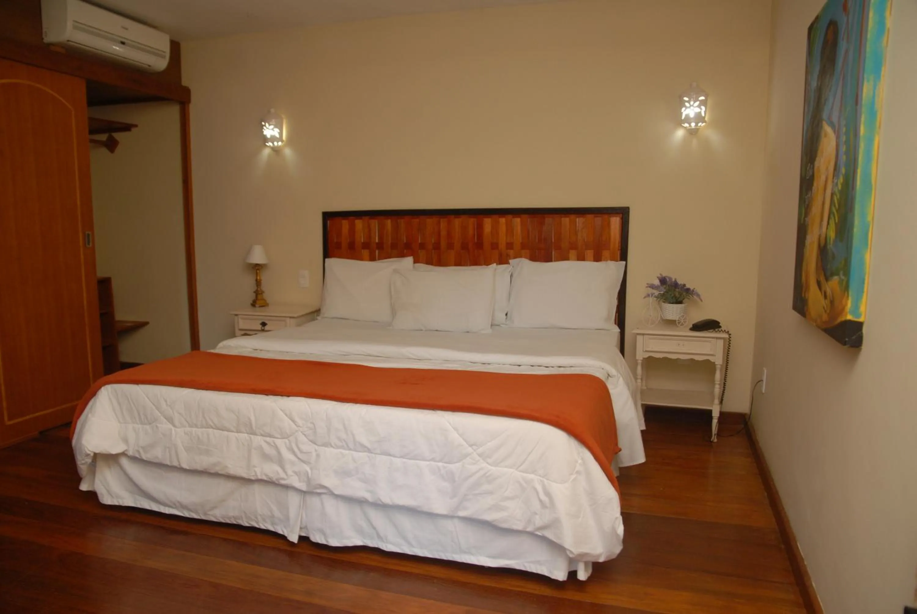 Bed in Pousada Mirante do Penedo