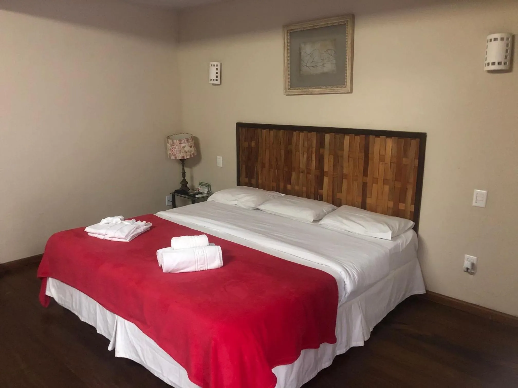 Bed in Pousada Mirante do Penedo