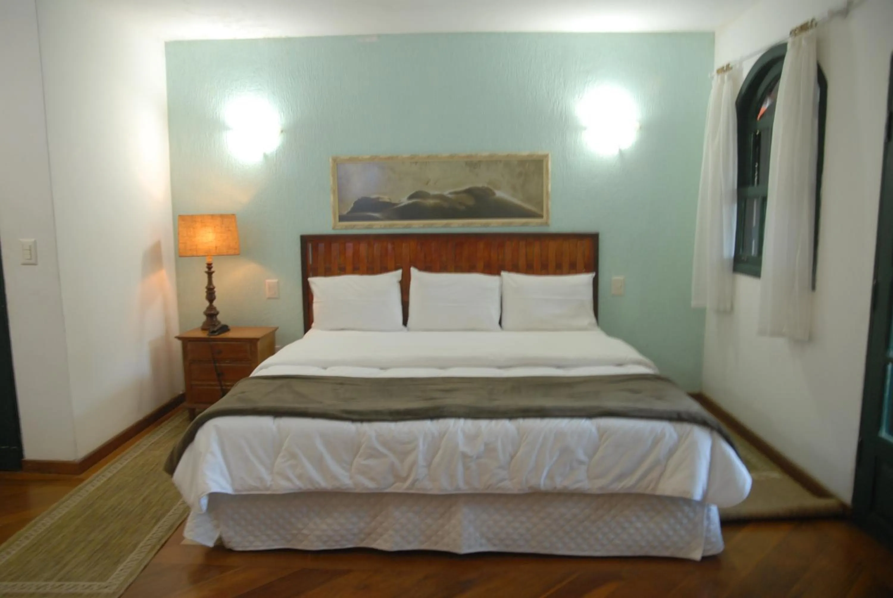 Bed in Pousada Mirante do Penedo