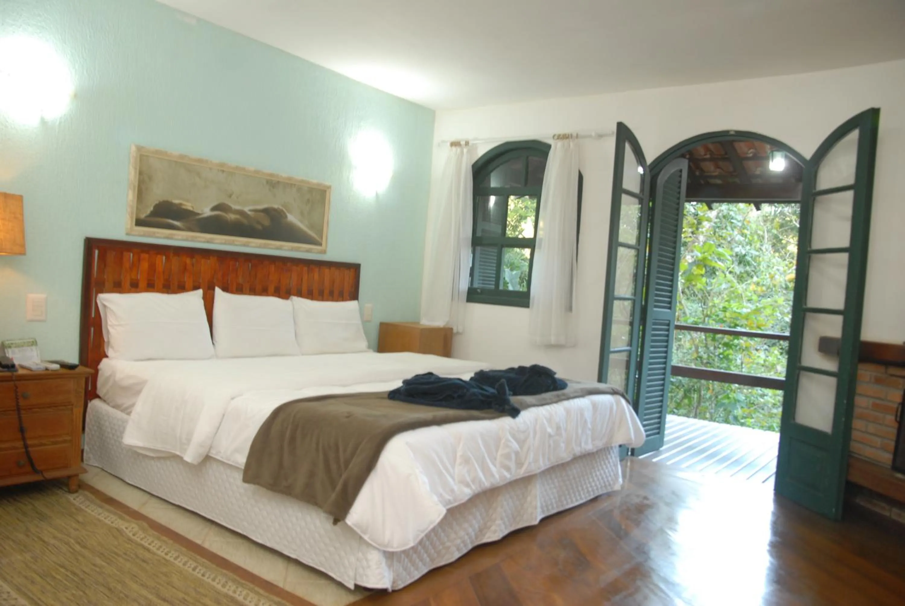 Bed in Pousada Mirante do Penedo