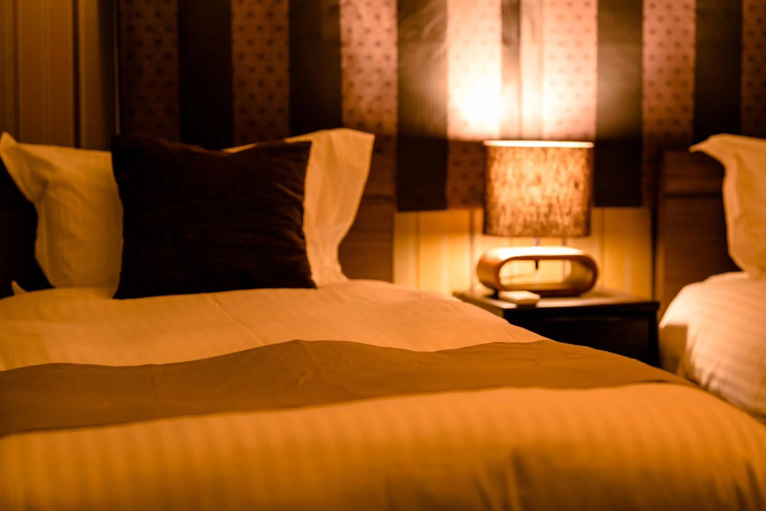 Decorative detail, Bed in villa yawaragi